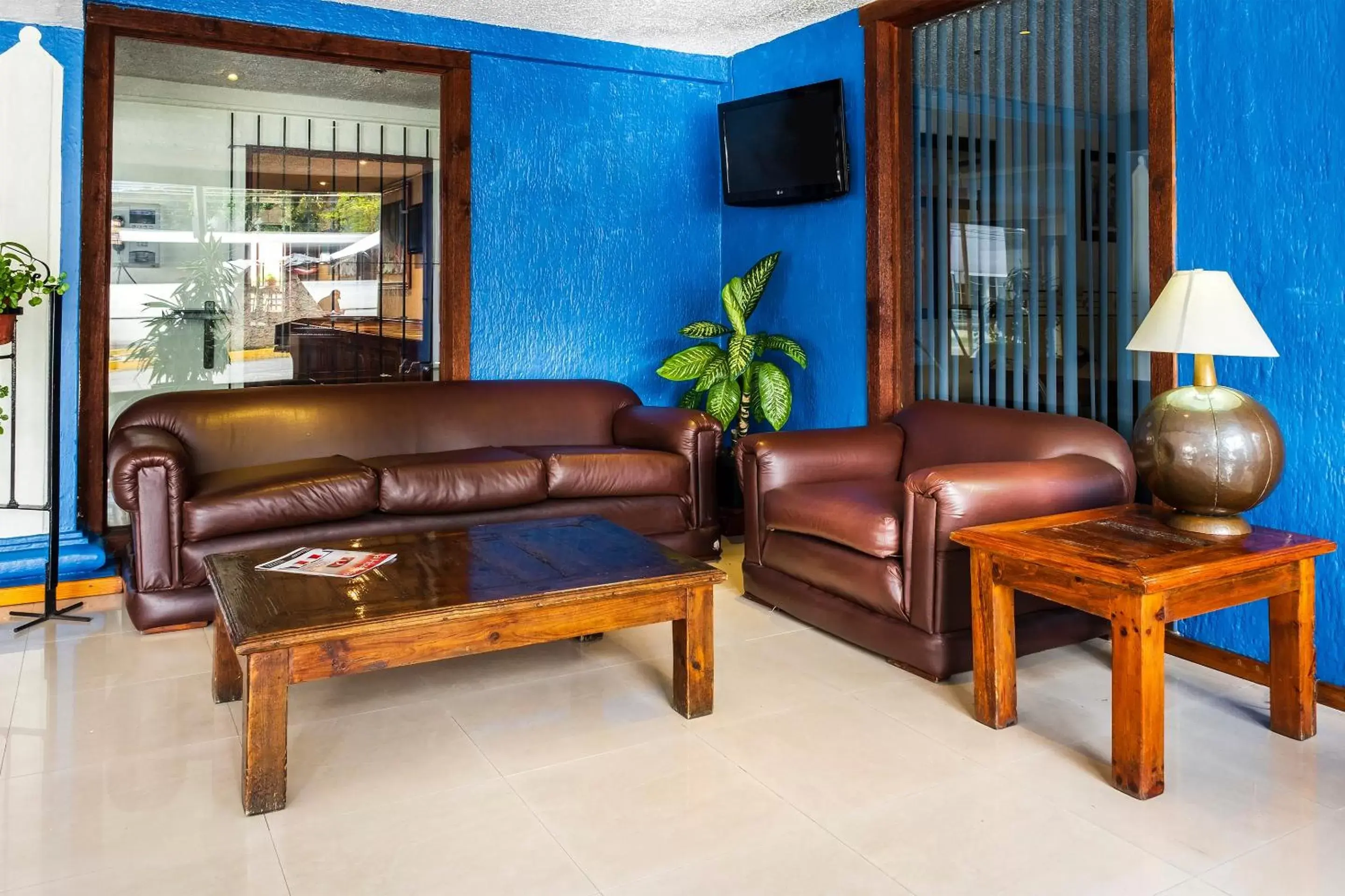 Lobby or reception, Seating Area in Capital O Hotel Central, Xalapa