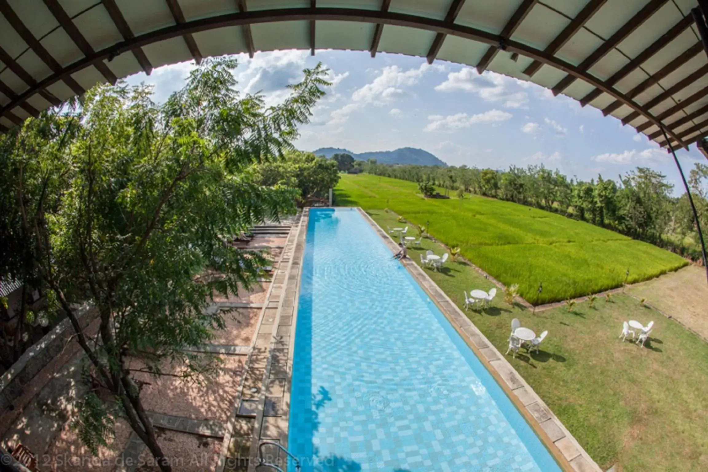 Swimming pool, Pool View in Sigiriana Resort by Thilanka