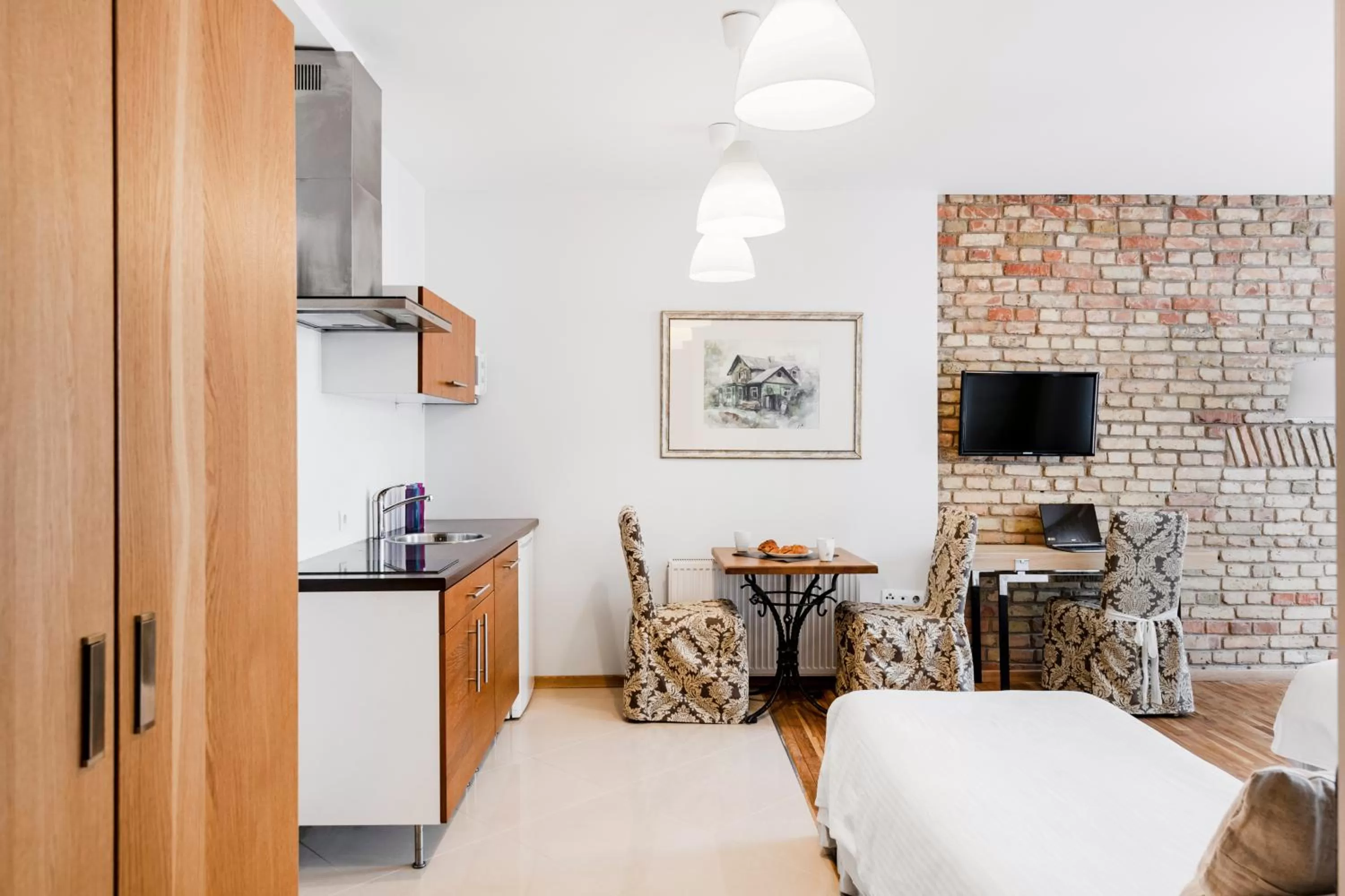 Kitchen or kitchenette in Vilnius Apartments