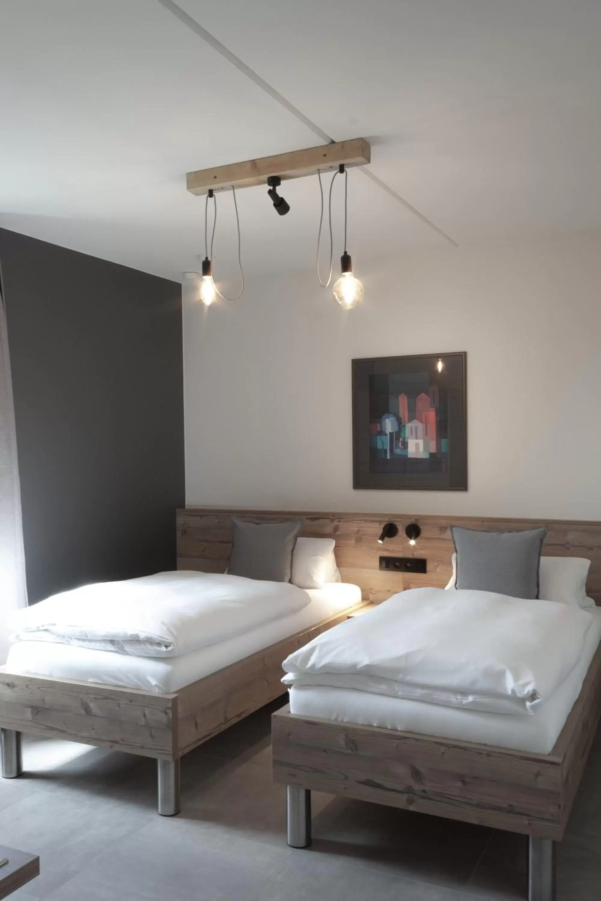 Twin Room - single occupancy - Disability Access in Hotel Restaurant Tychon AG Twin Room - single occupancy - Disability Access in Hotel Restaurant Tychon AG