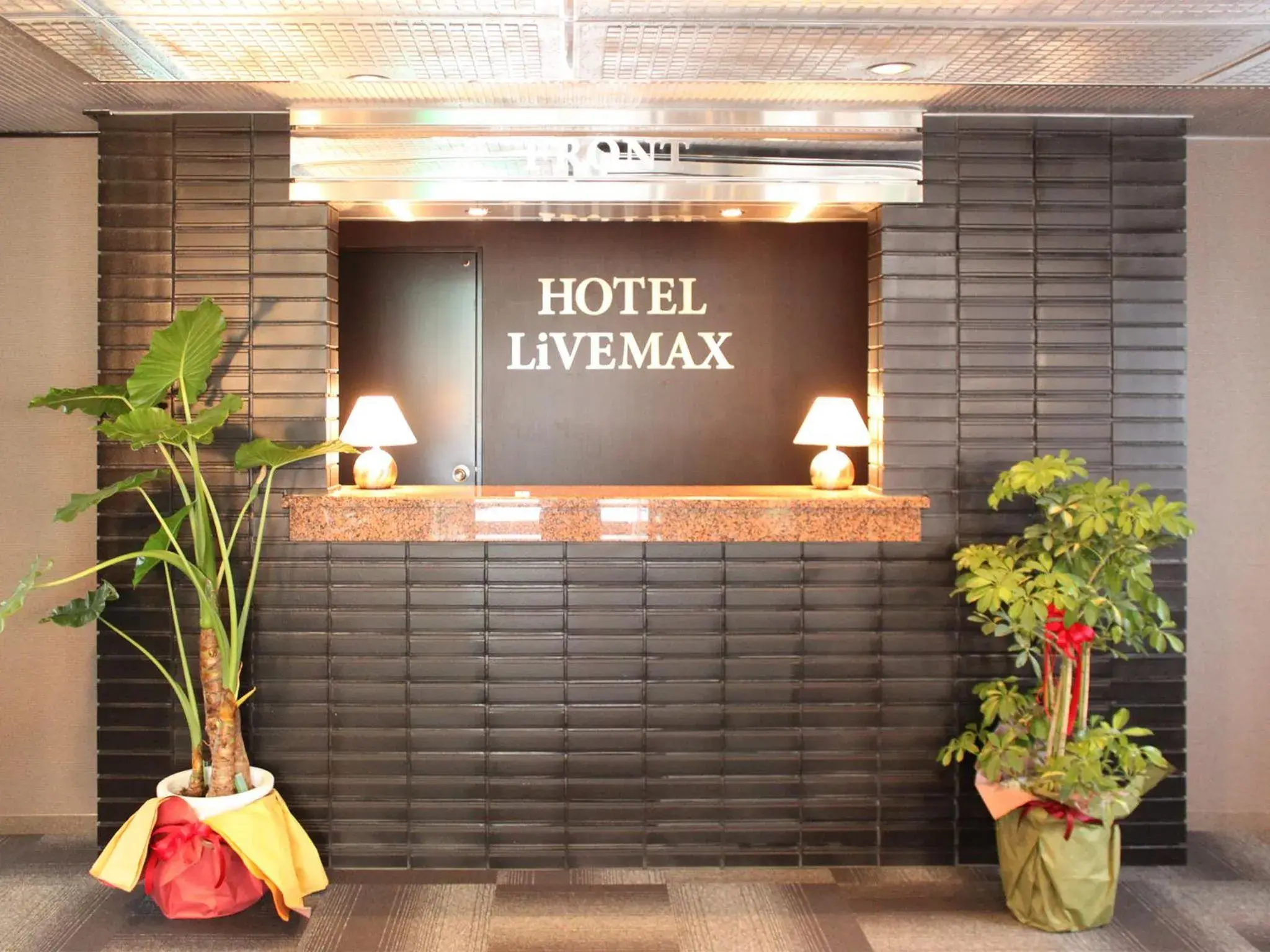 Lobby or reception in HOTEL LiVEMAX BUDGET Chofu-Ekimae