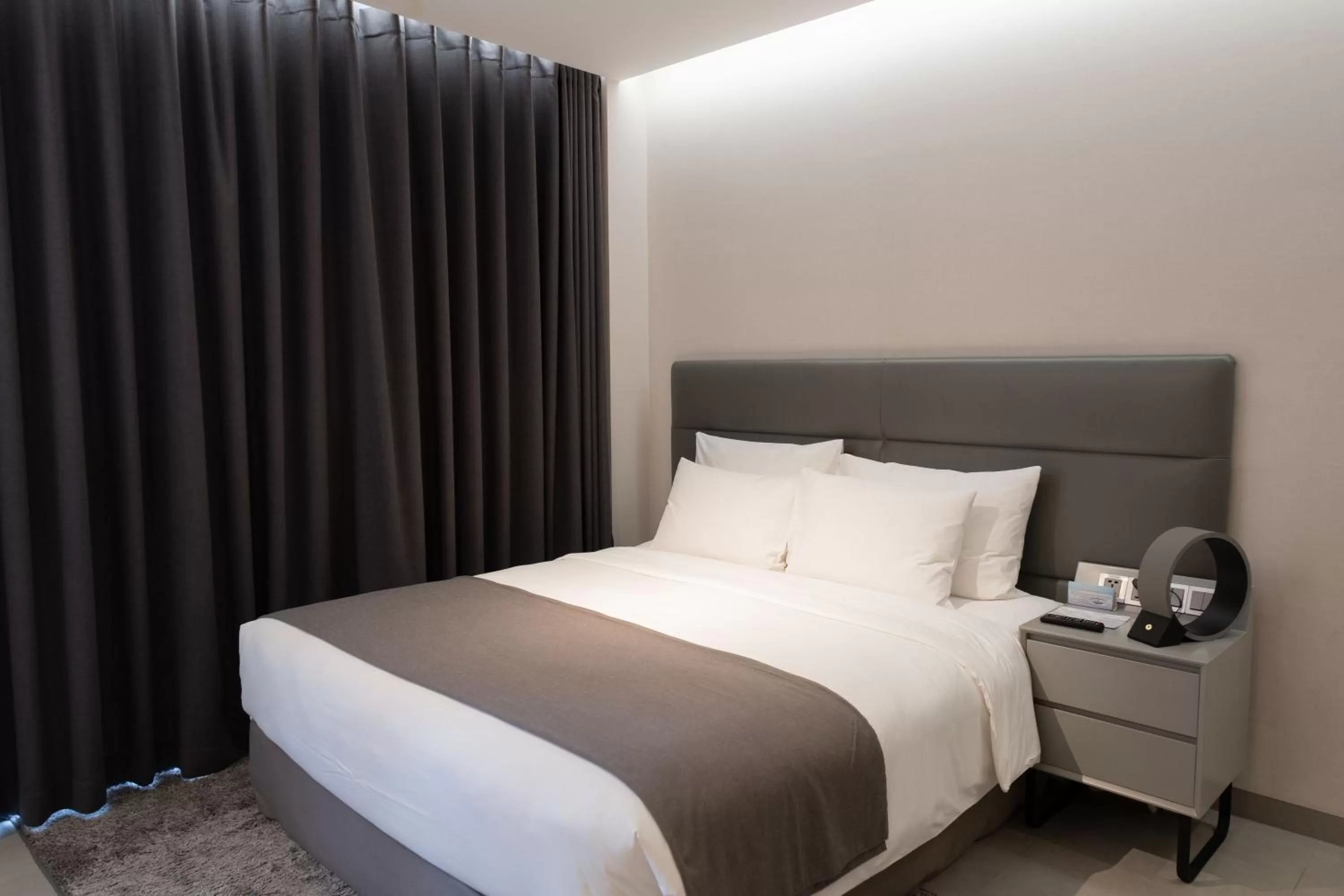 Bed in M Hotel Saigon