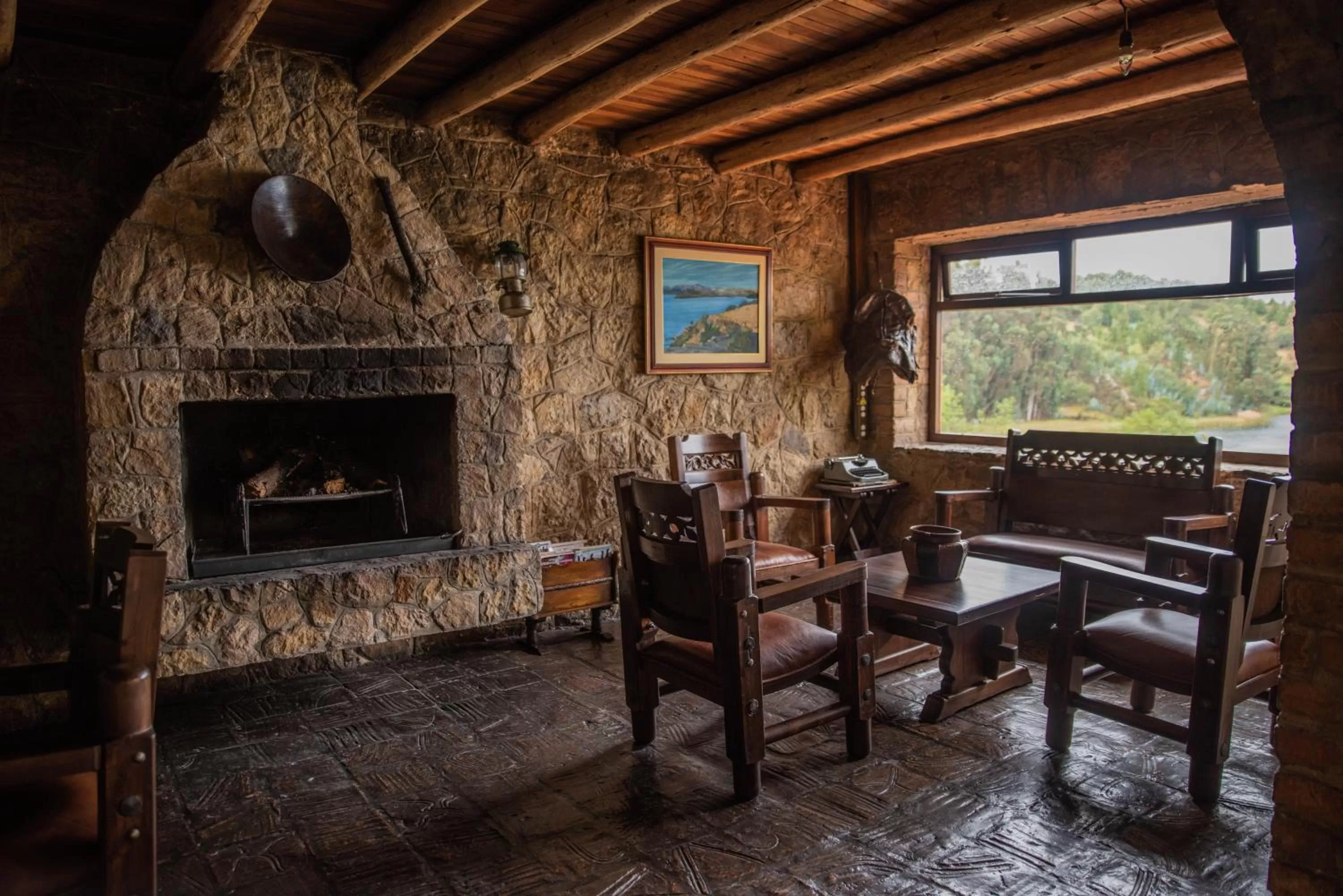 Seating area in Hotel Refugio Pozo Azul