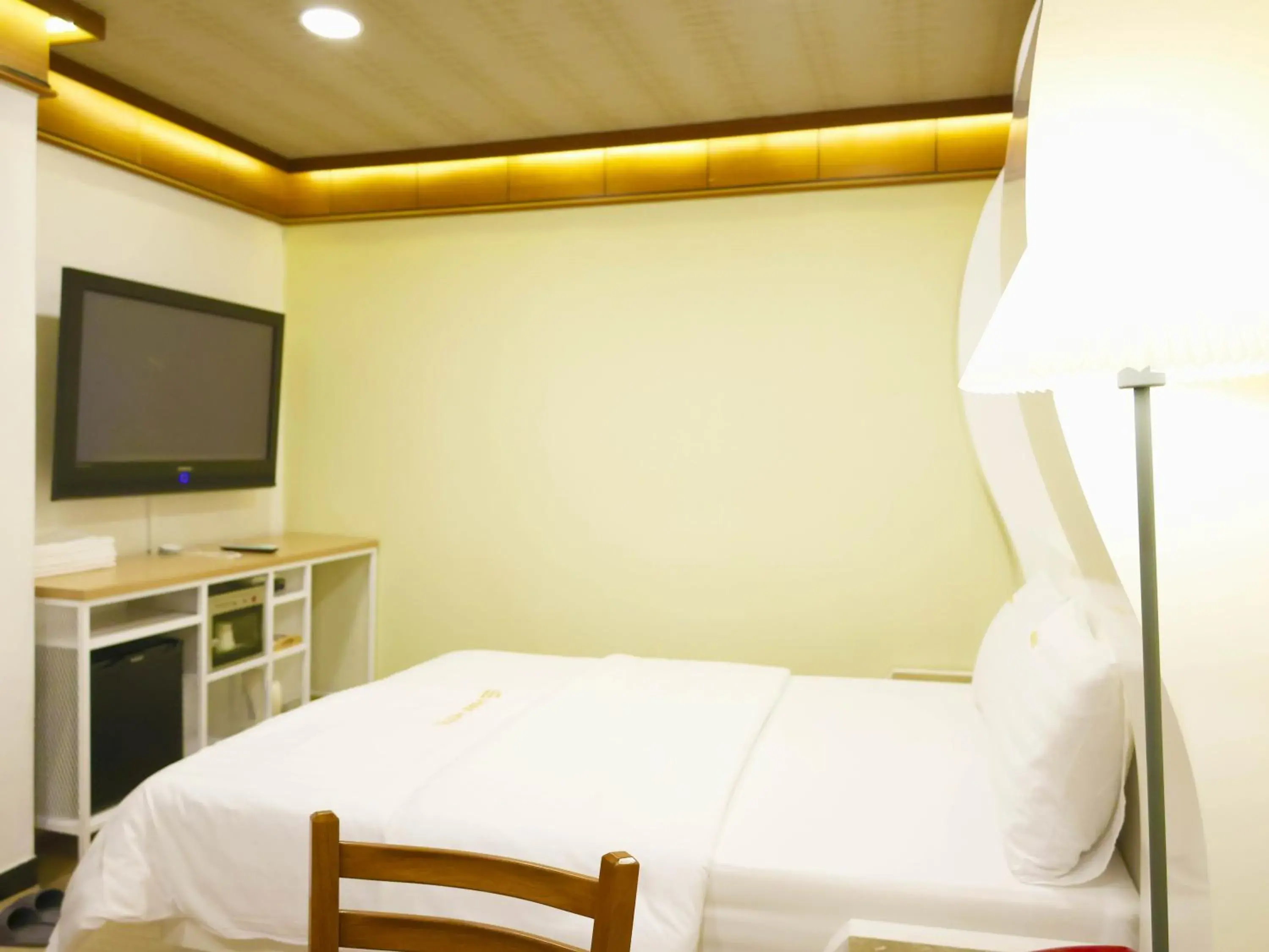 Bed in Goodstay Andong Park Hotel