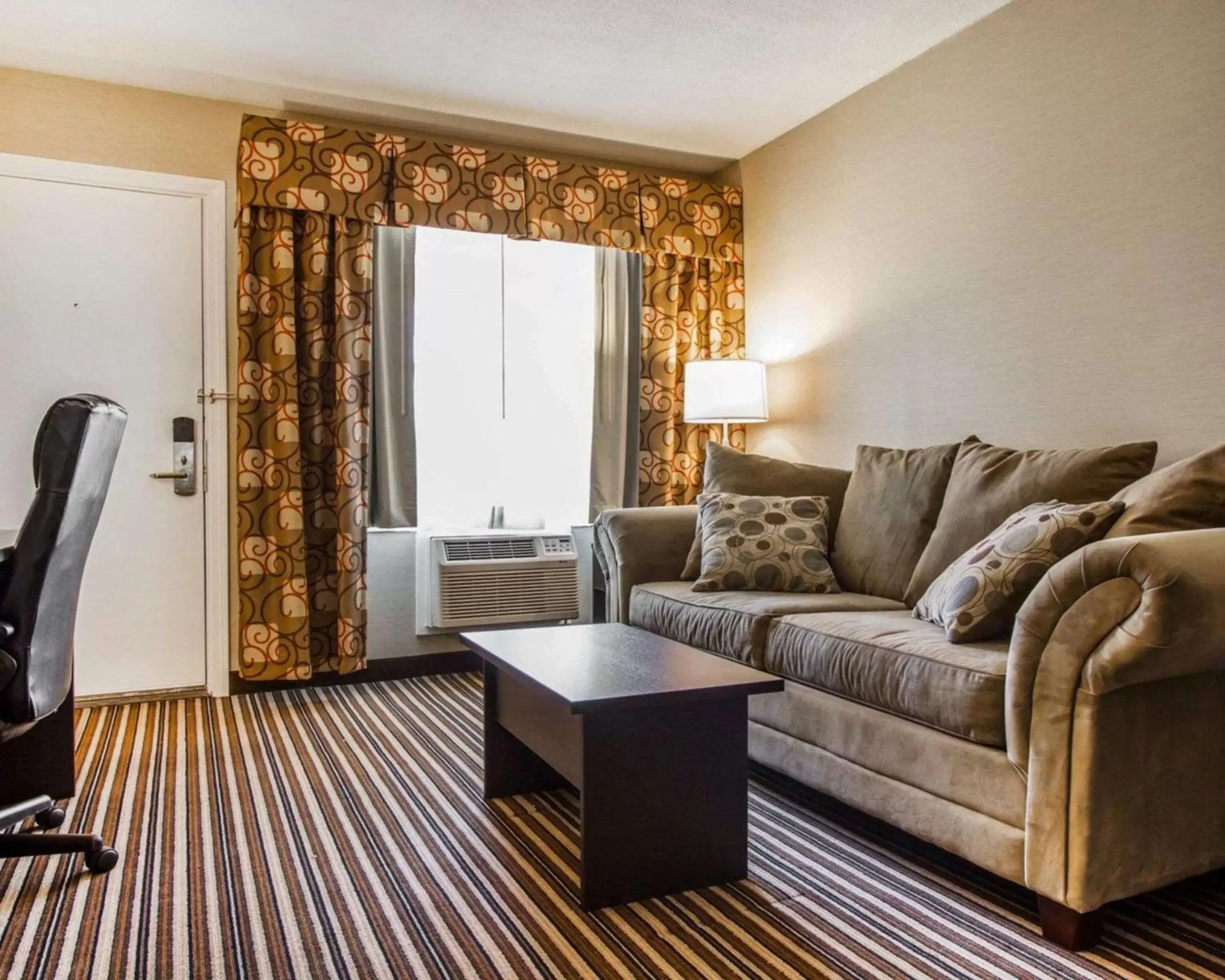 Bedroom, Seating Area in Quality Inn & Suites