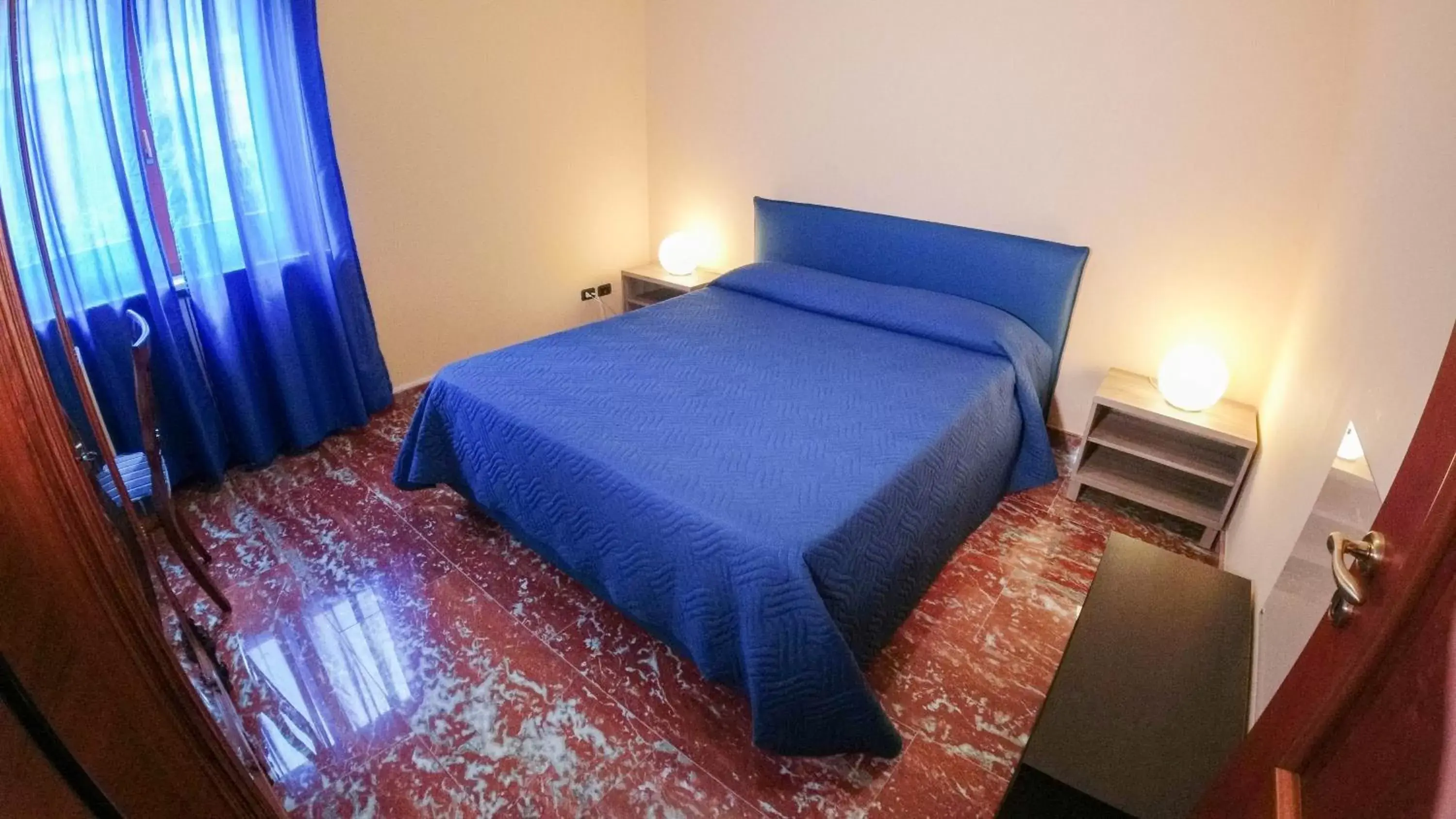 Bed in Il Piccolo Hotel