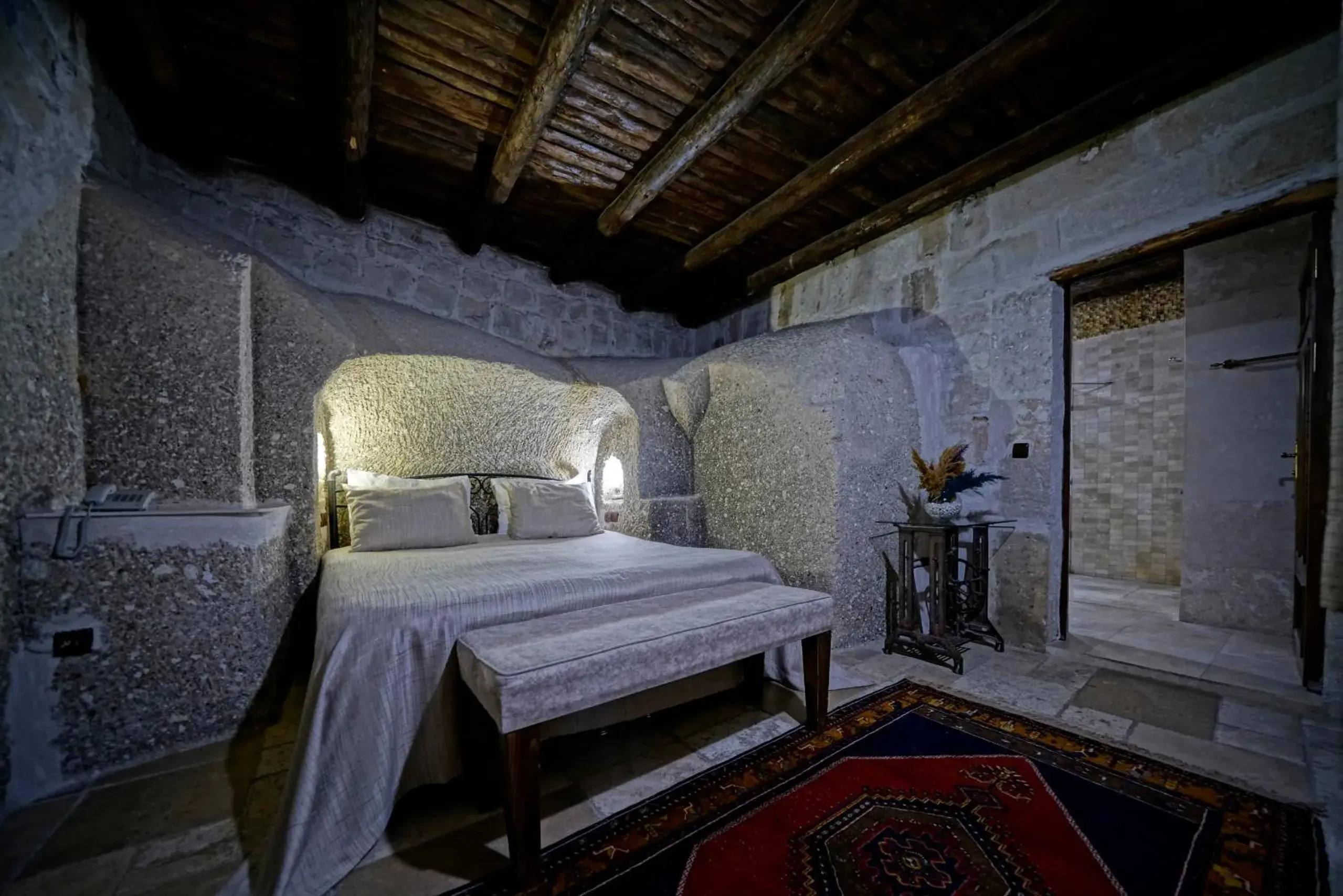 Bed in Holiday Cave Hotel