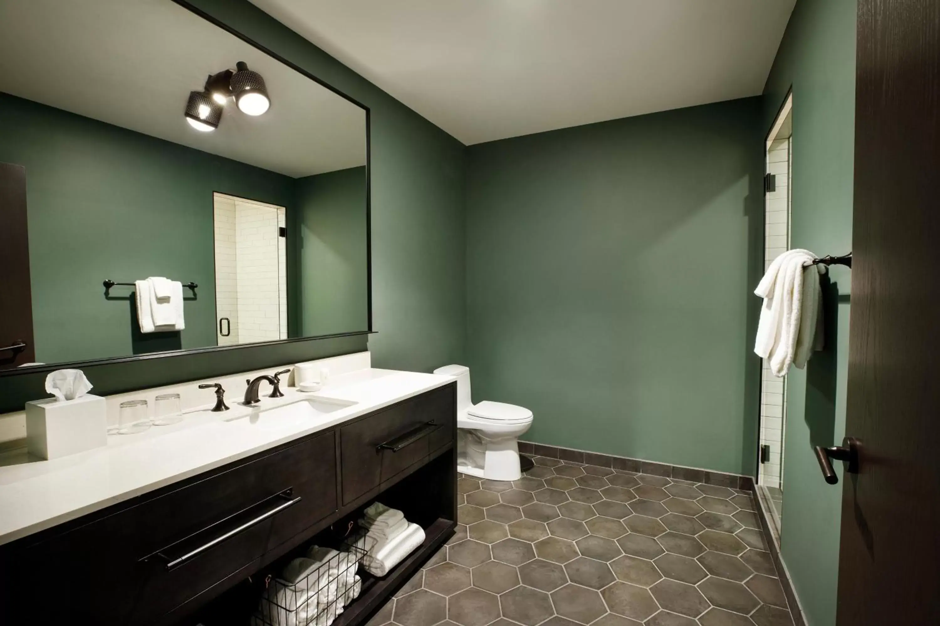 Bathroom in Cyrus Hotel, Topeka, a Tribute Portfolio Hotel