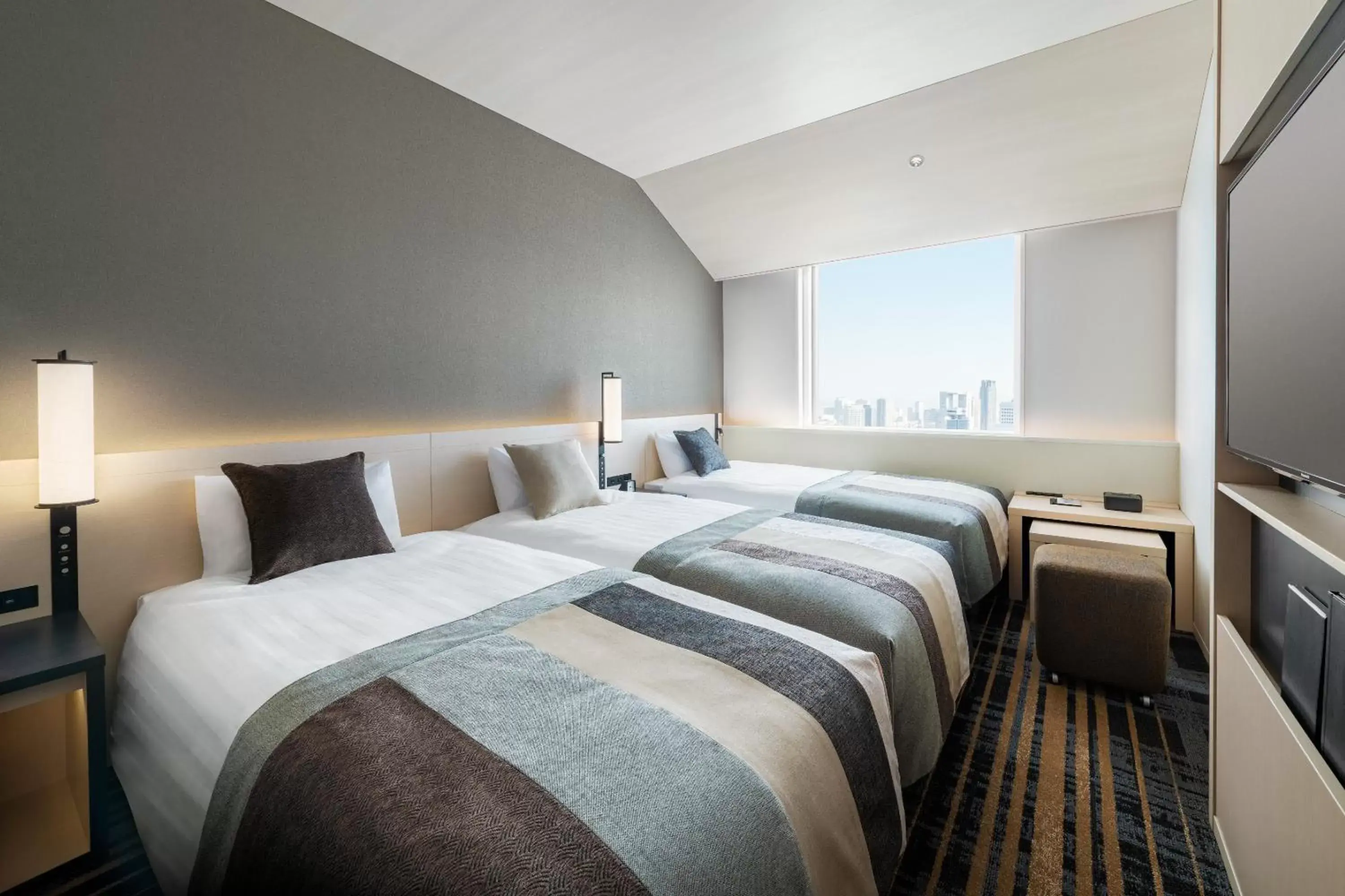 Photo of the whole room, Bed in Hotel Hankyu RESPIRE OSAKA Photo of the whole room, Bed in Hotel Hankyu RESPIRE OSAKA