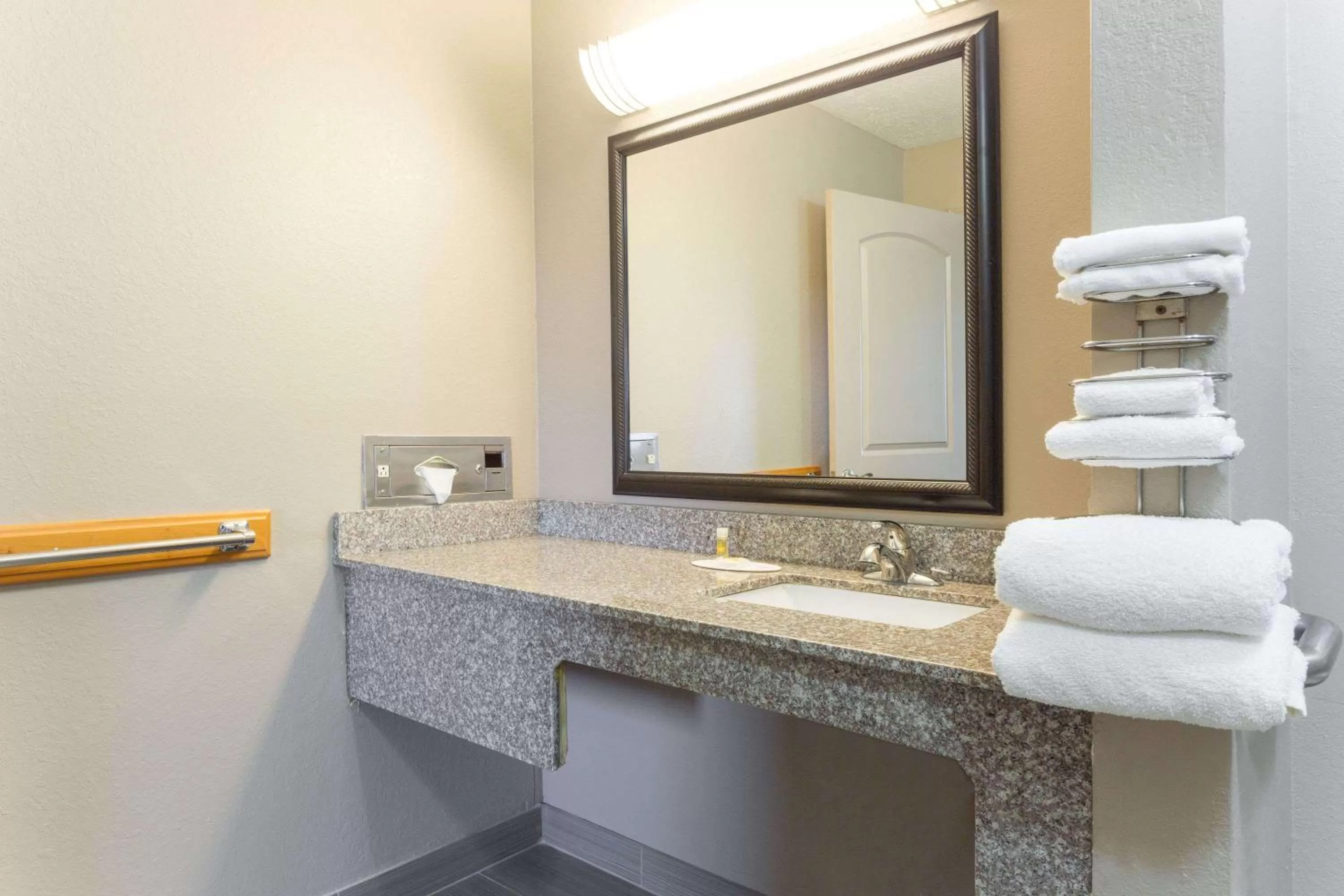 Bathroom in Days Inn by Wyndham Forest