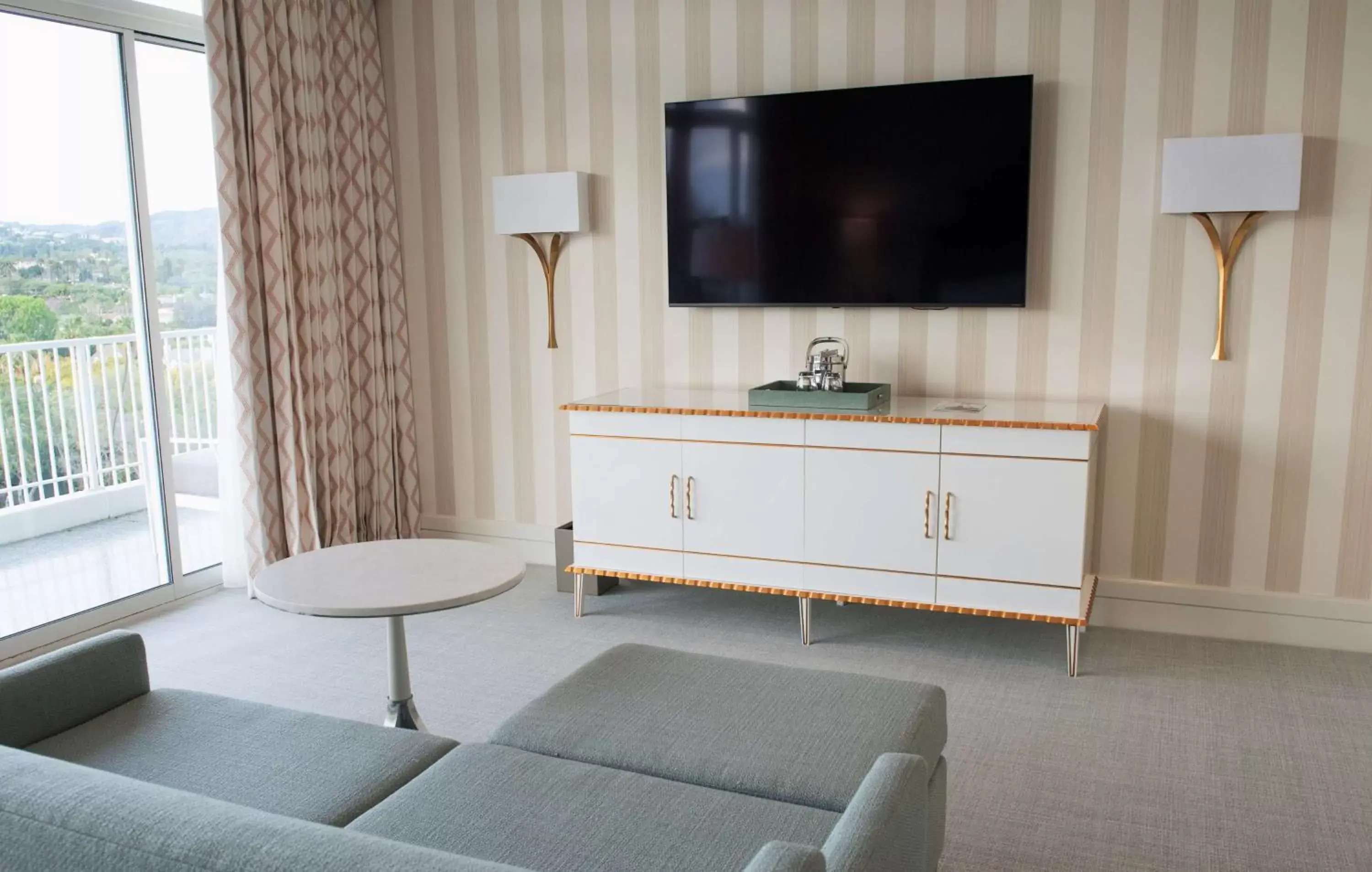 Living room, TV/Entertainment Center in The Beverly Hilton