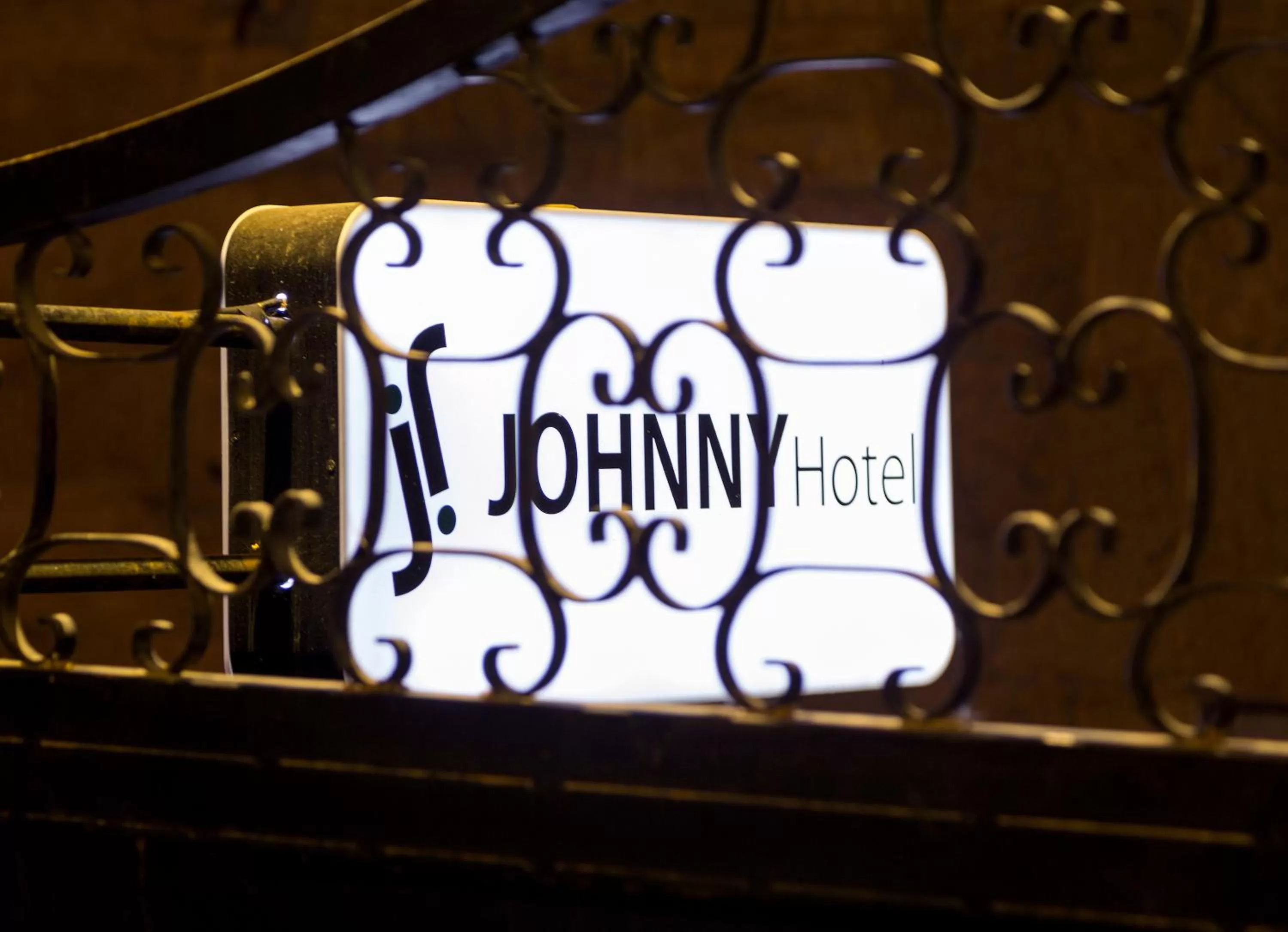 Property logo or sign in Johnny Hotel