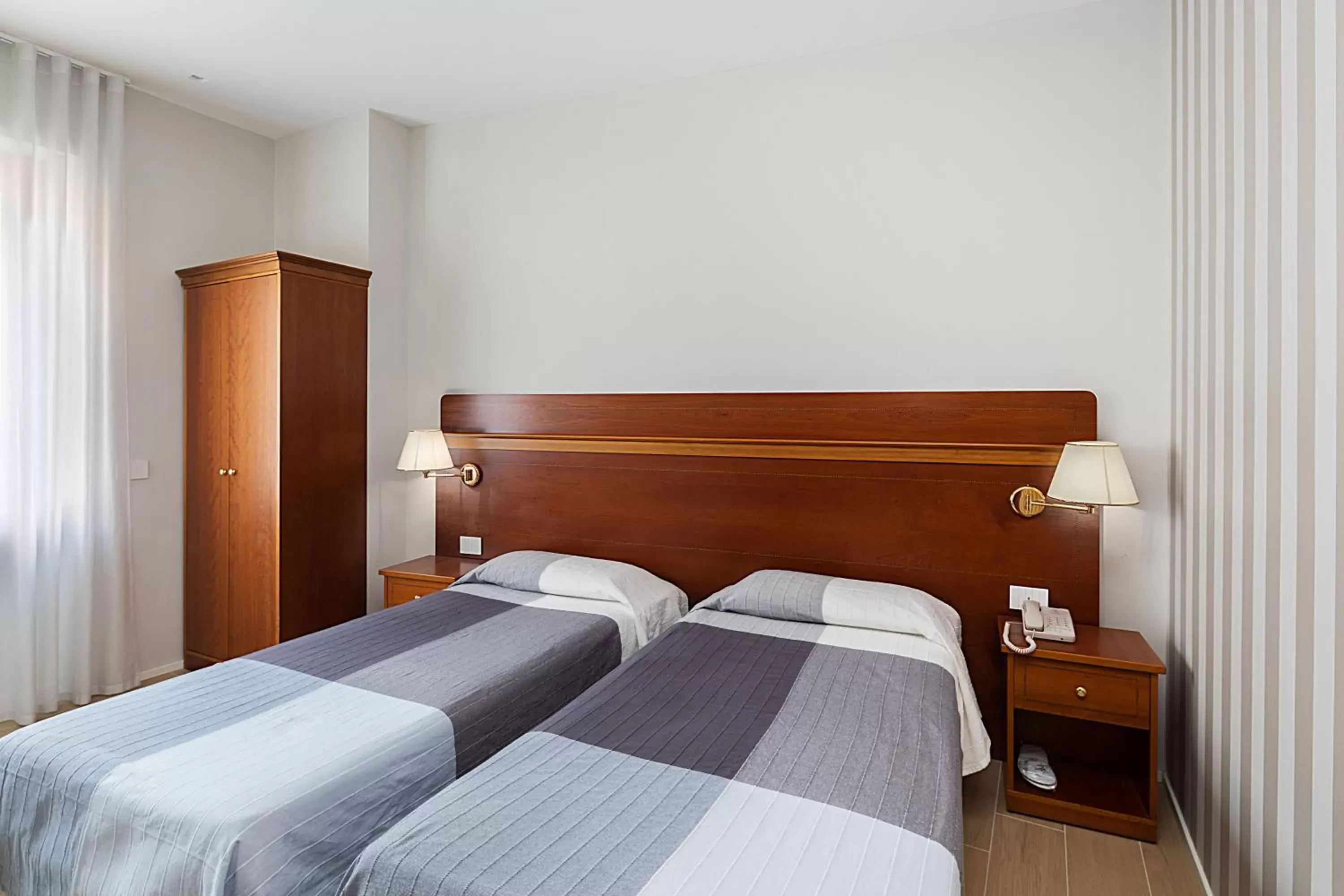 Bed in Hotel Excelsior Pavia