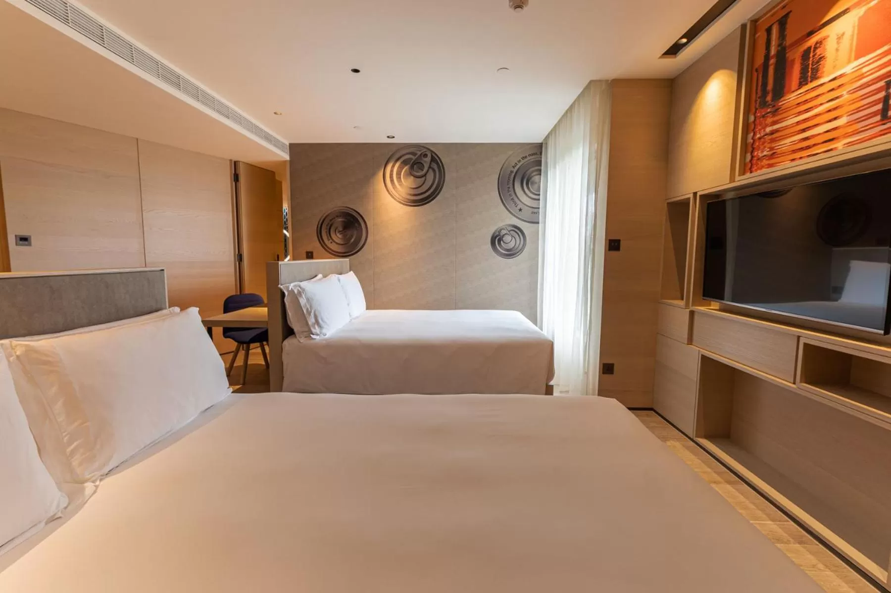 Photo of the whole room, Bed in Hotel Indigo Kaohsiung Central Park by IHG