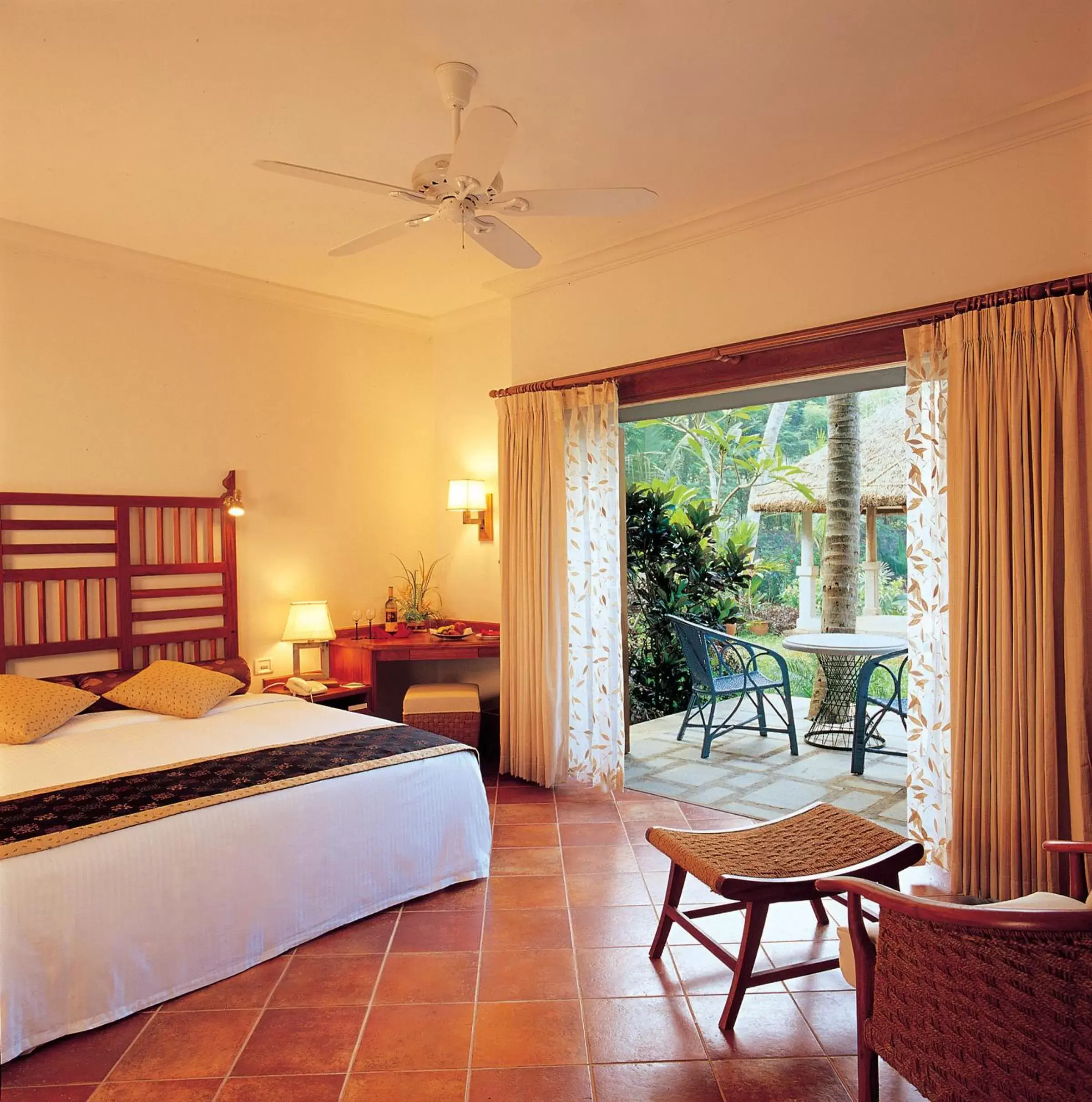 Photo of the whole room, Bed in Taj Green Cove Resort and Spa Kovalam