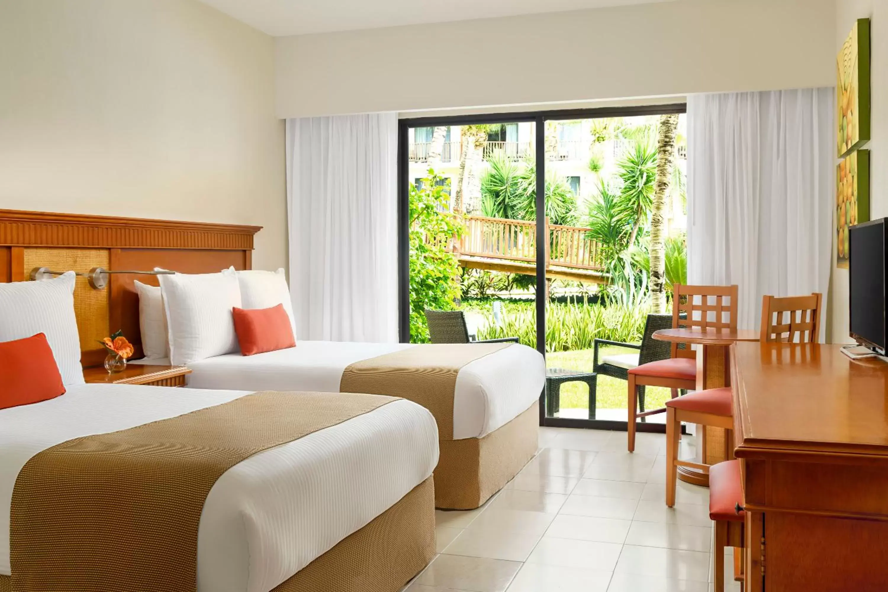 Bed in The Reef Coco Beach & Spa- Optional All Inclusive