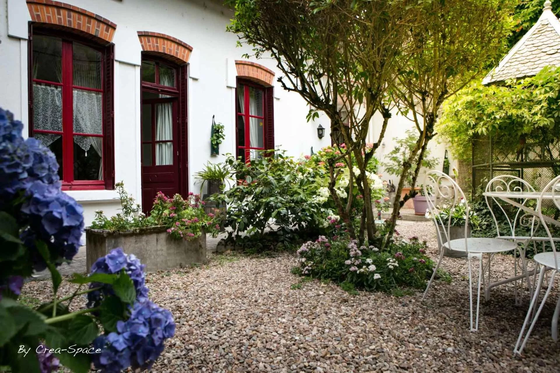 Patio in Logis Hotel La Tourelle du Beffroi