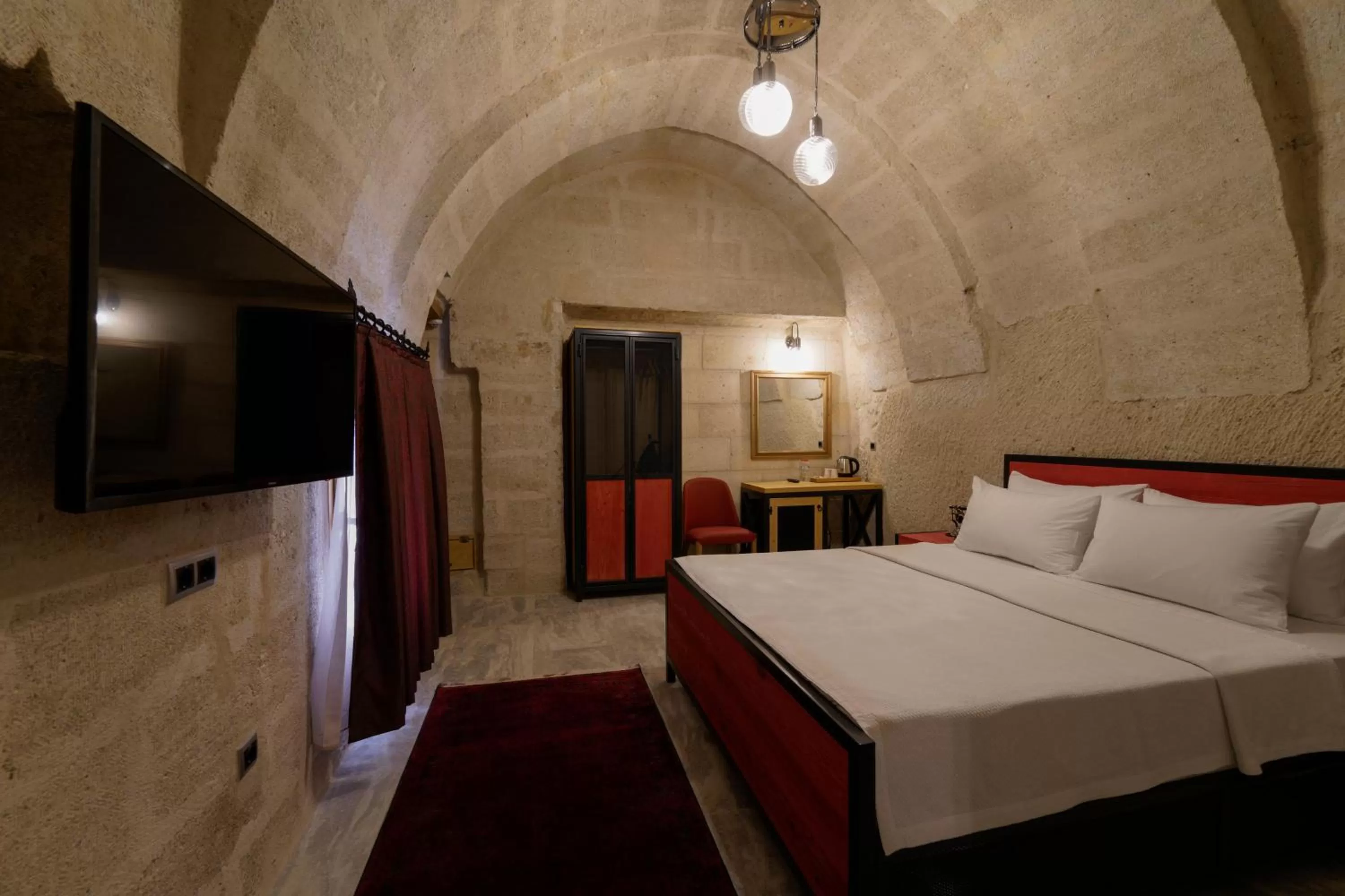 Bed in The Niche Cave Hotel