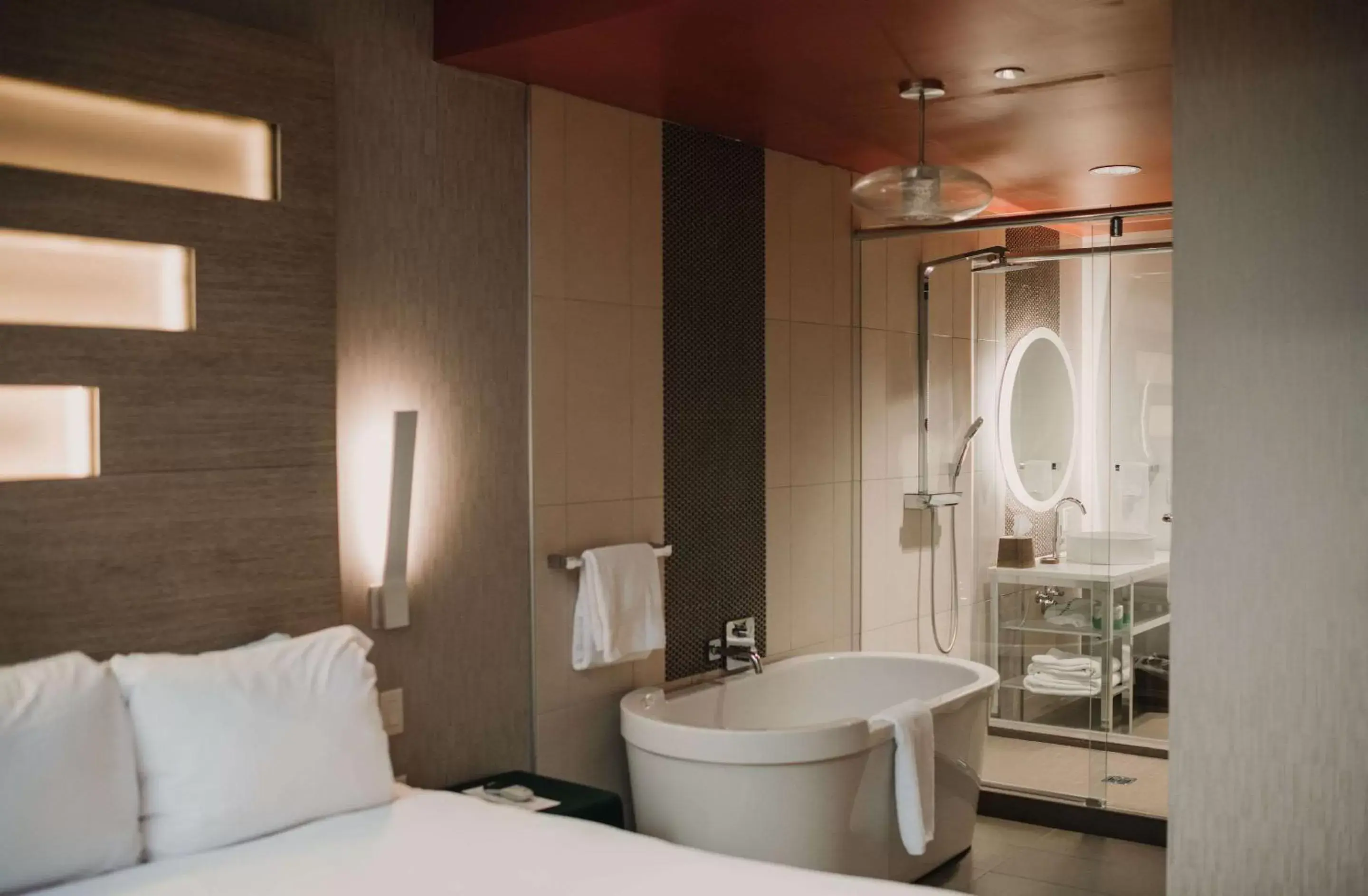 Bedroom, Bathroom in CityFlatsHotel - Grand Rapids, Ascend Hotel Collection