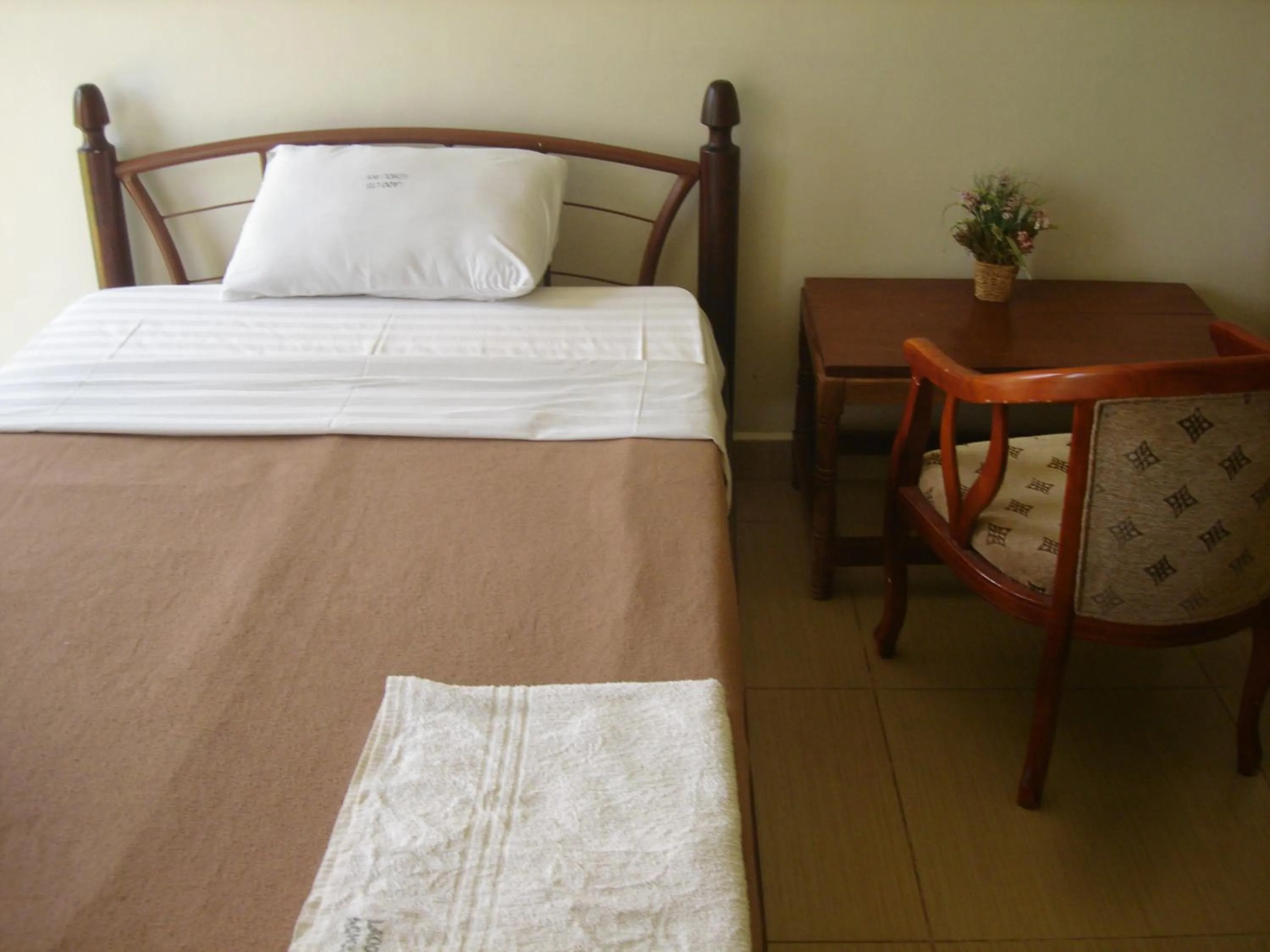 Bedroom in Acholi Inn