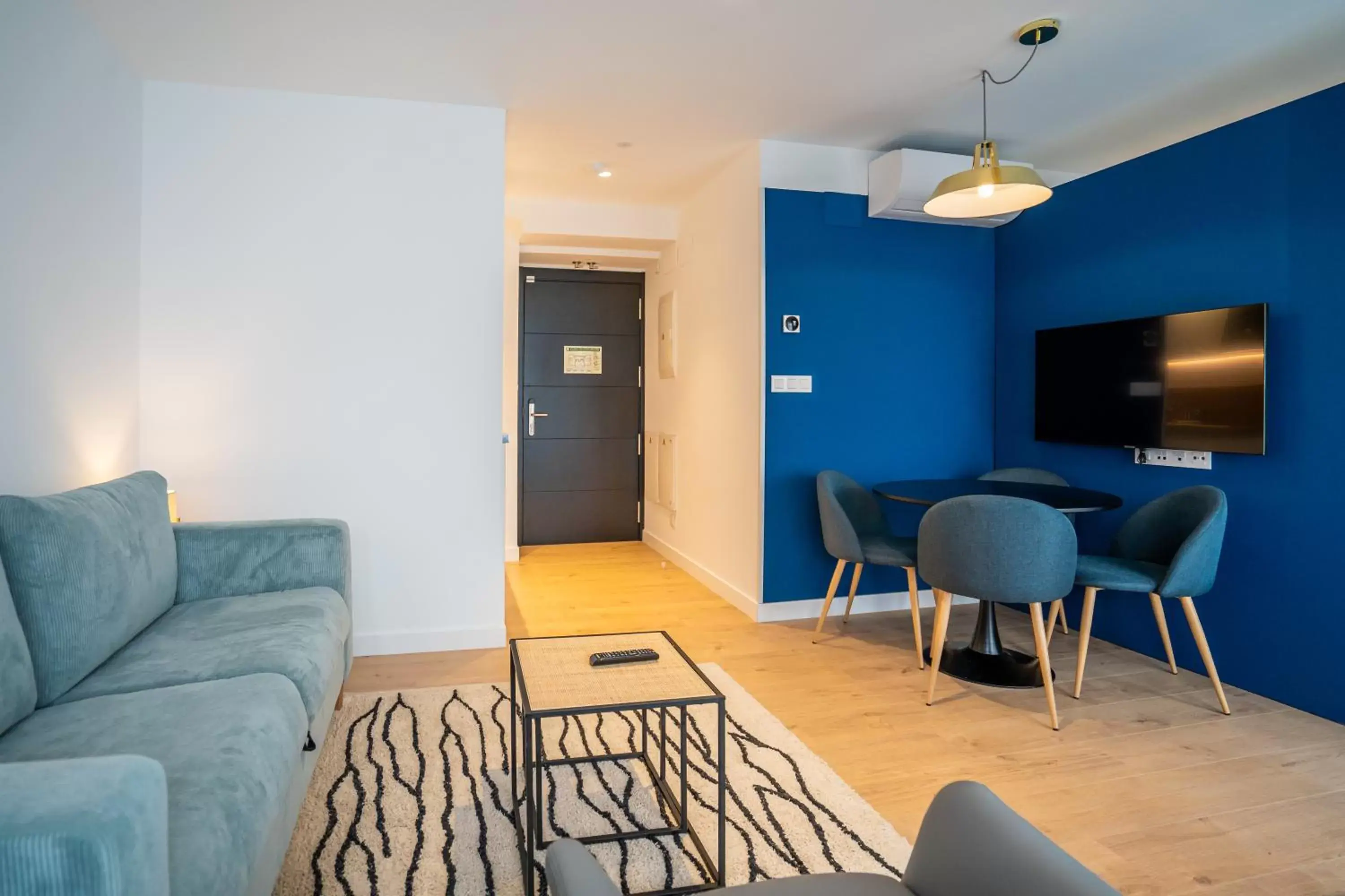 Photo of the whole room, Seating Area in abba Apartments Playa de Gros San Sebastián