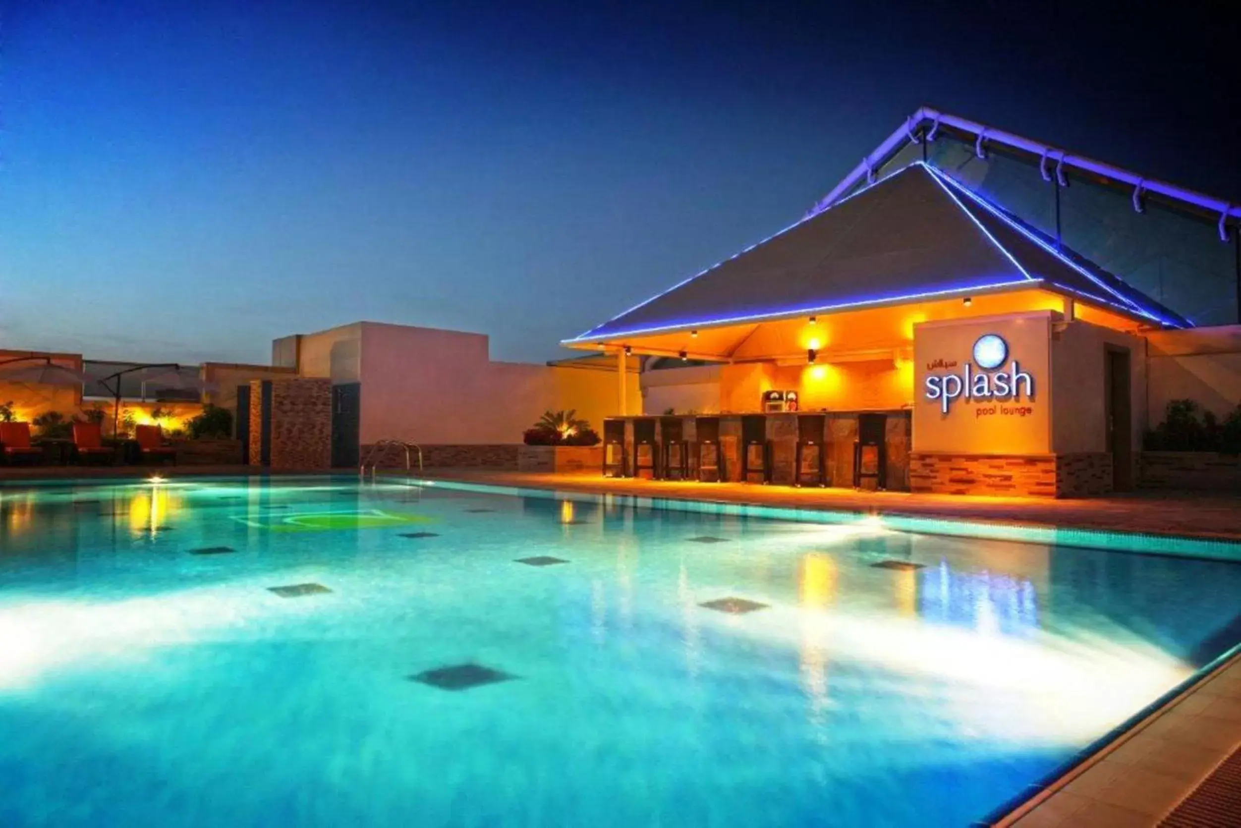 Swimming pool, Property Building in TIME Grand Plaza Hotel, Dubai Airport