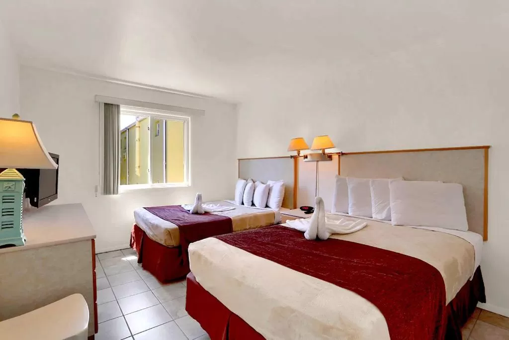 Bed in Heart of Wildwood Boardwalk Motel