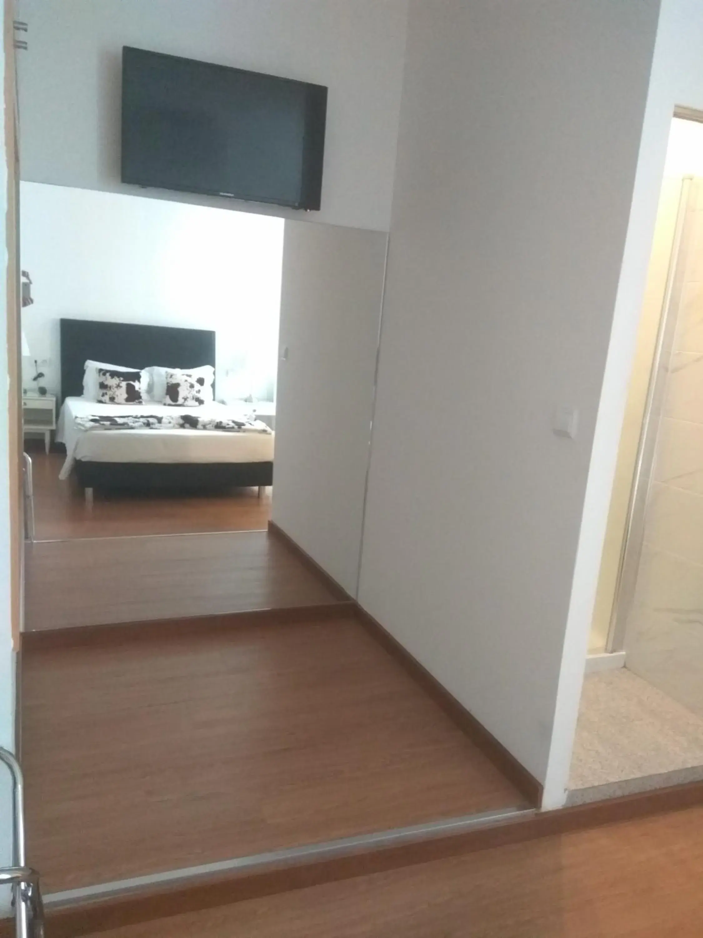 Bedroom, TV/Entertainment Center in Hotel Paulista