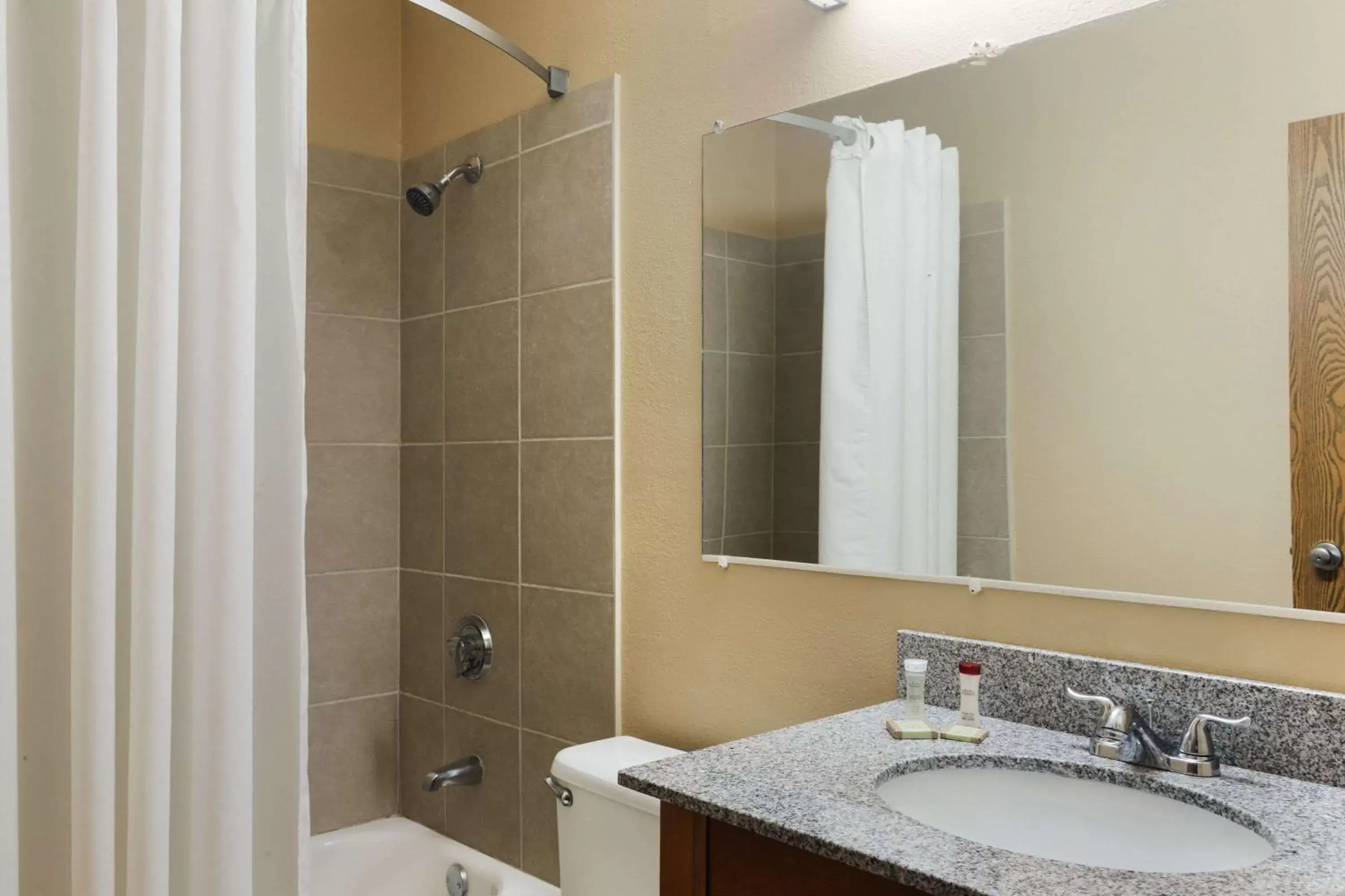 Bathroom in Super 8 by Wyndham Taylor/Detroit Area