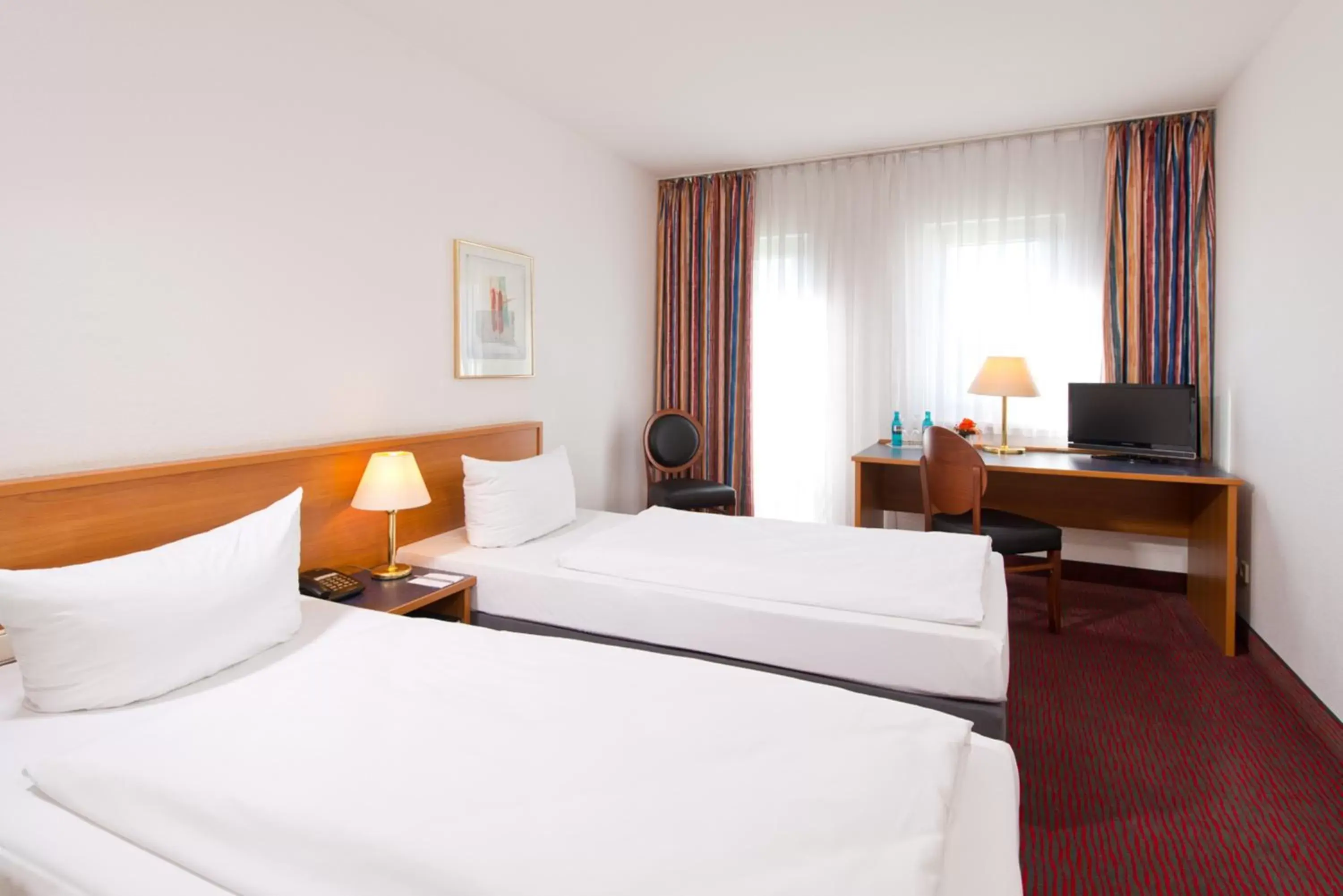 Photo of the whole room, Bed in ACHAT Hotel Darmstadt Griesheim