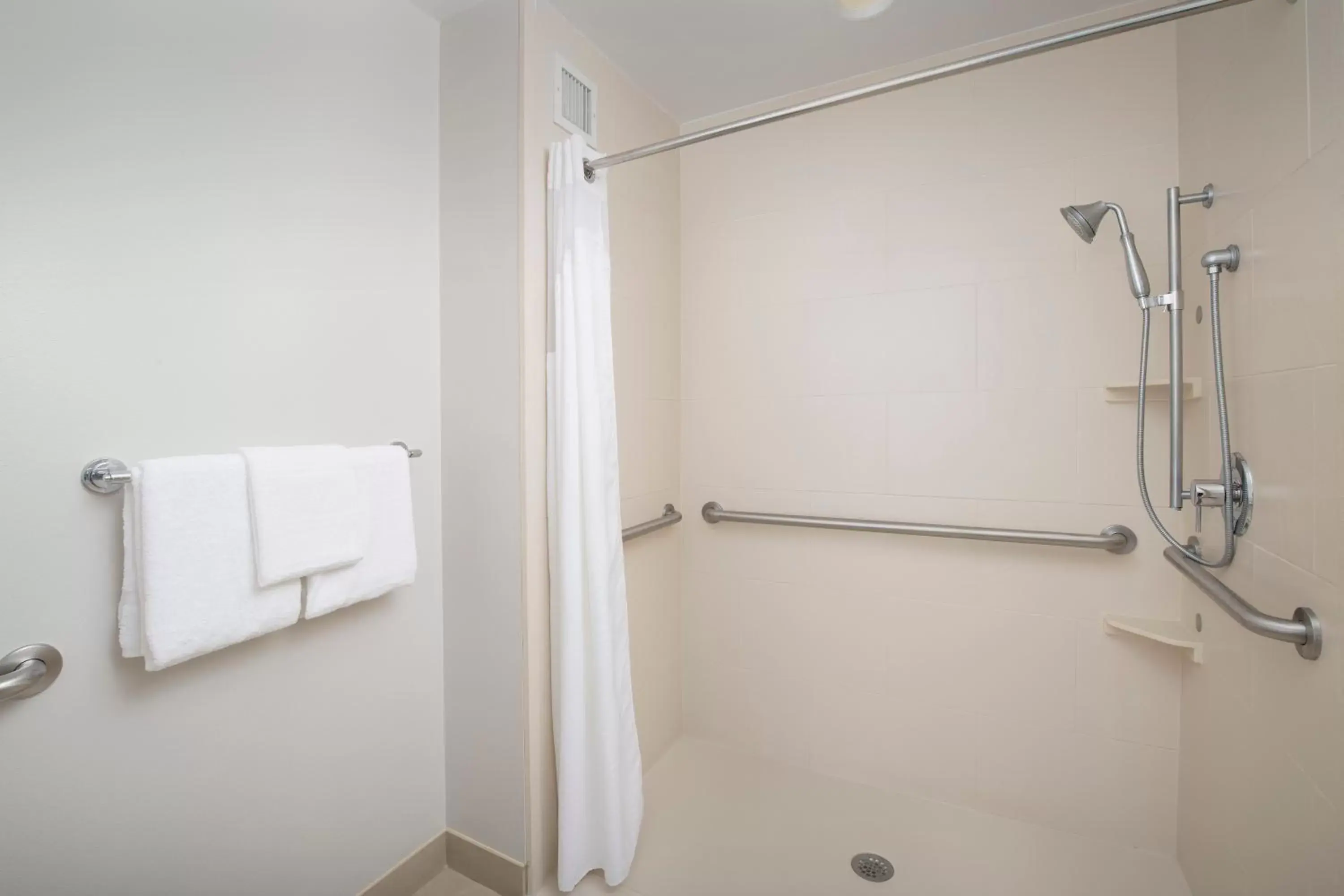 King Room - Hearing Accessible - Roll-in Shower in Holiday Inn Express Jacksonville Beach, an IHG Hotel