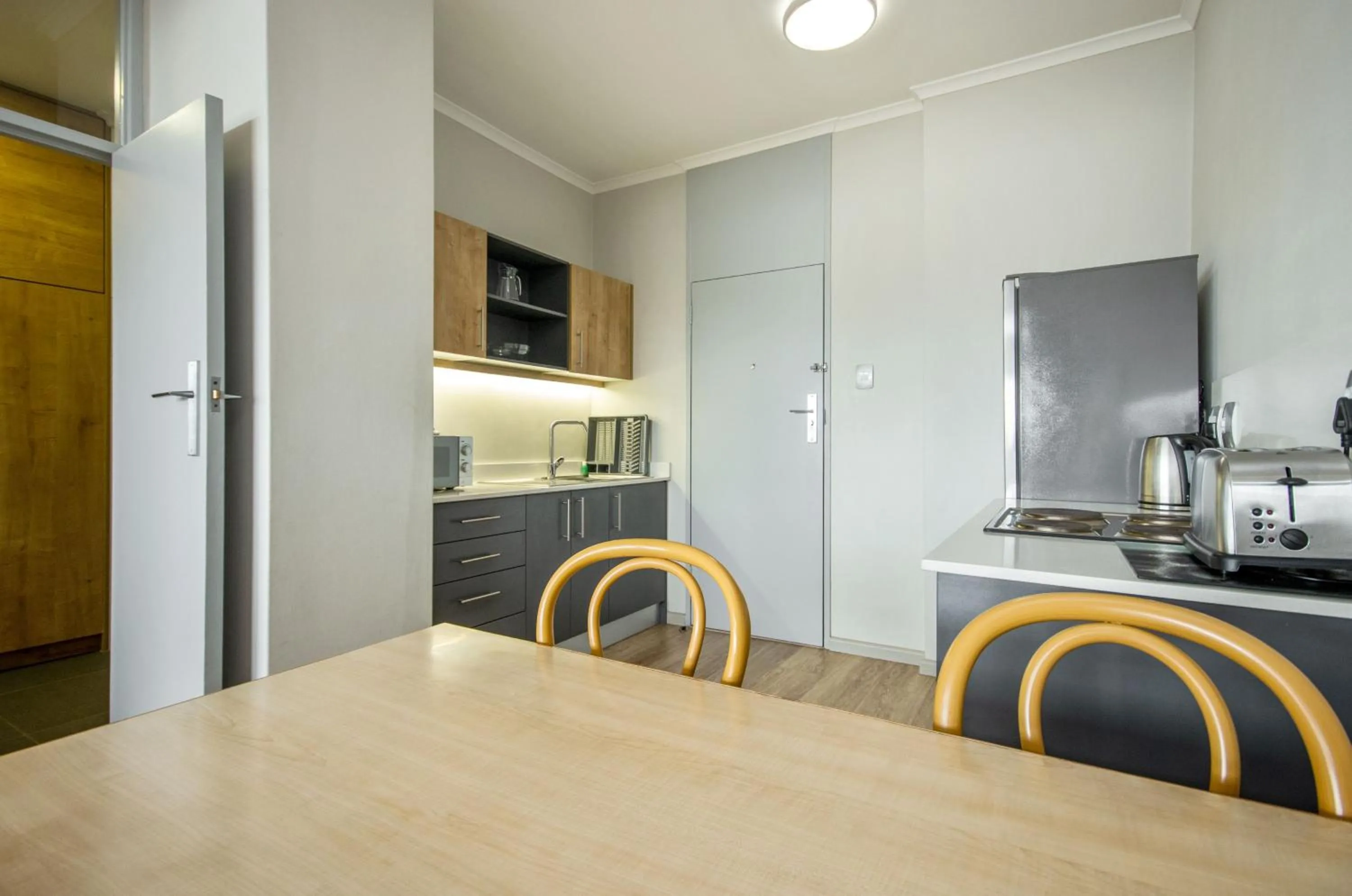 Seating area in Gardens Centre Holiday Apartments