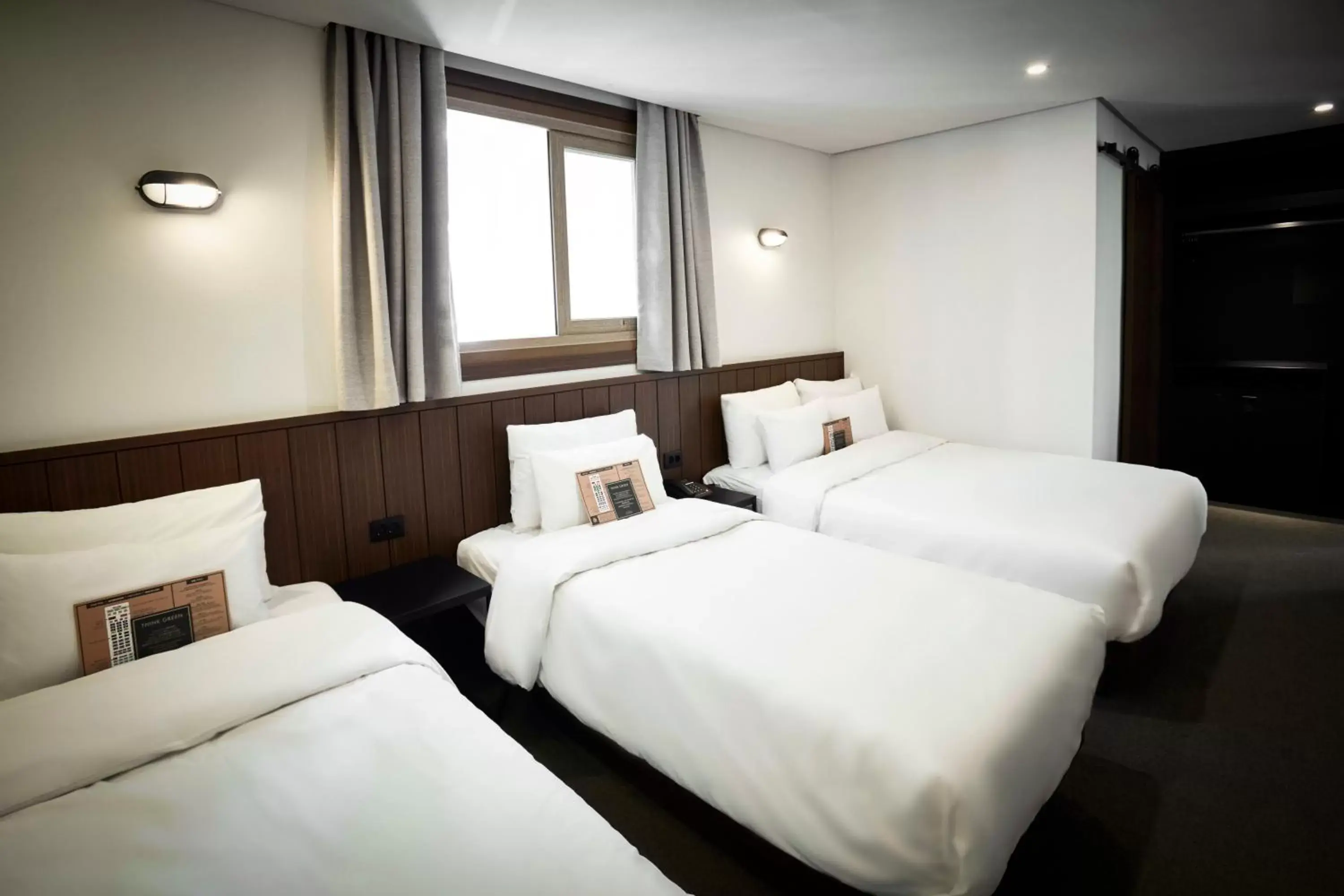 Bed in Hotel Lumia Myeongdong