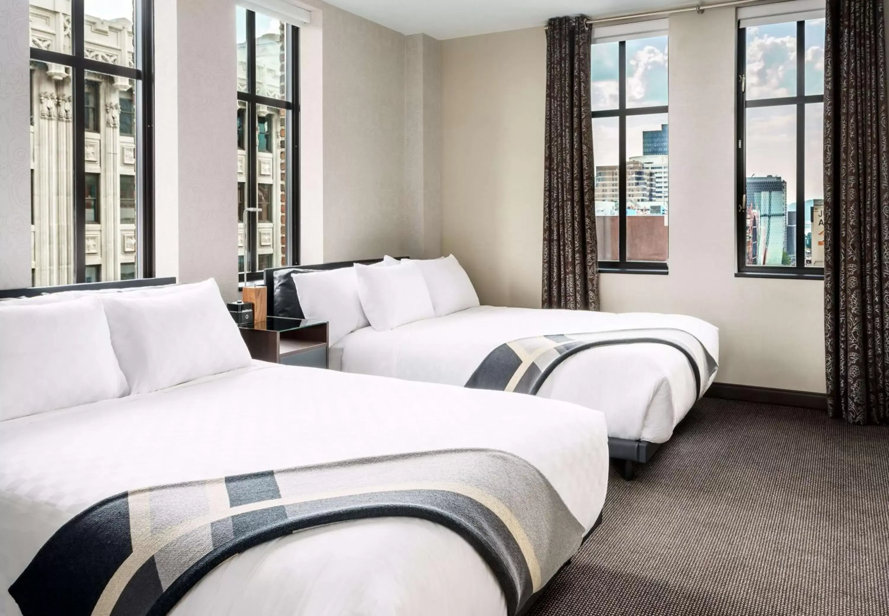 Bed in Joinery Hotel Pittsburgh, Curio Collection by Hilton