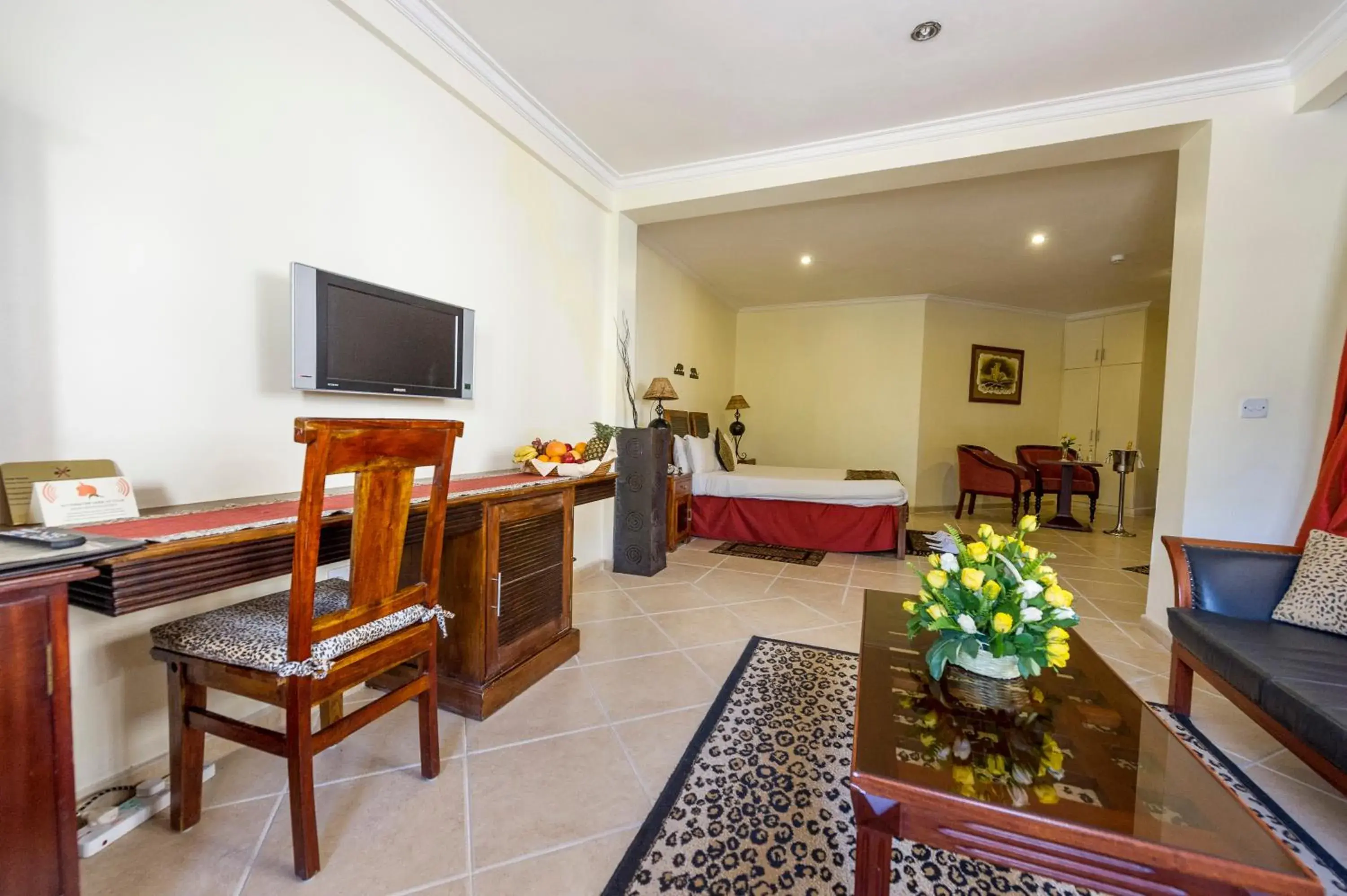 Bedroom in The African Tulip Hotel