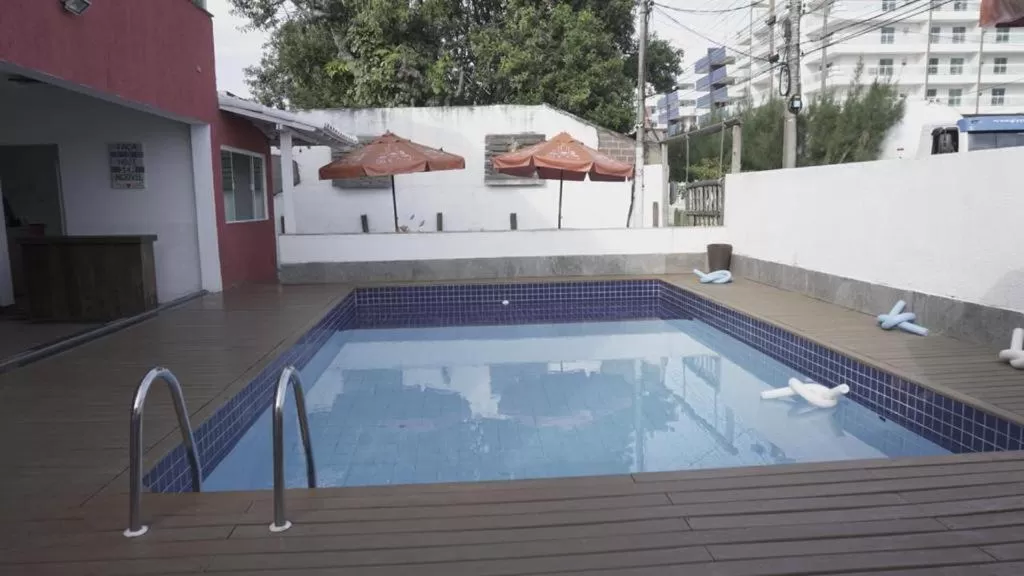 Swimming Pool in Trevo De Arraial pousada em cabo frio