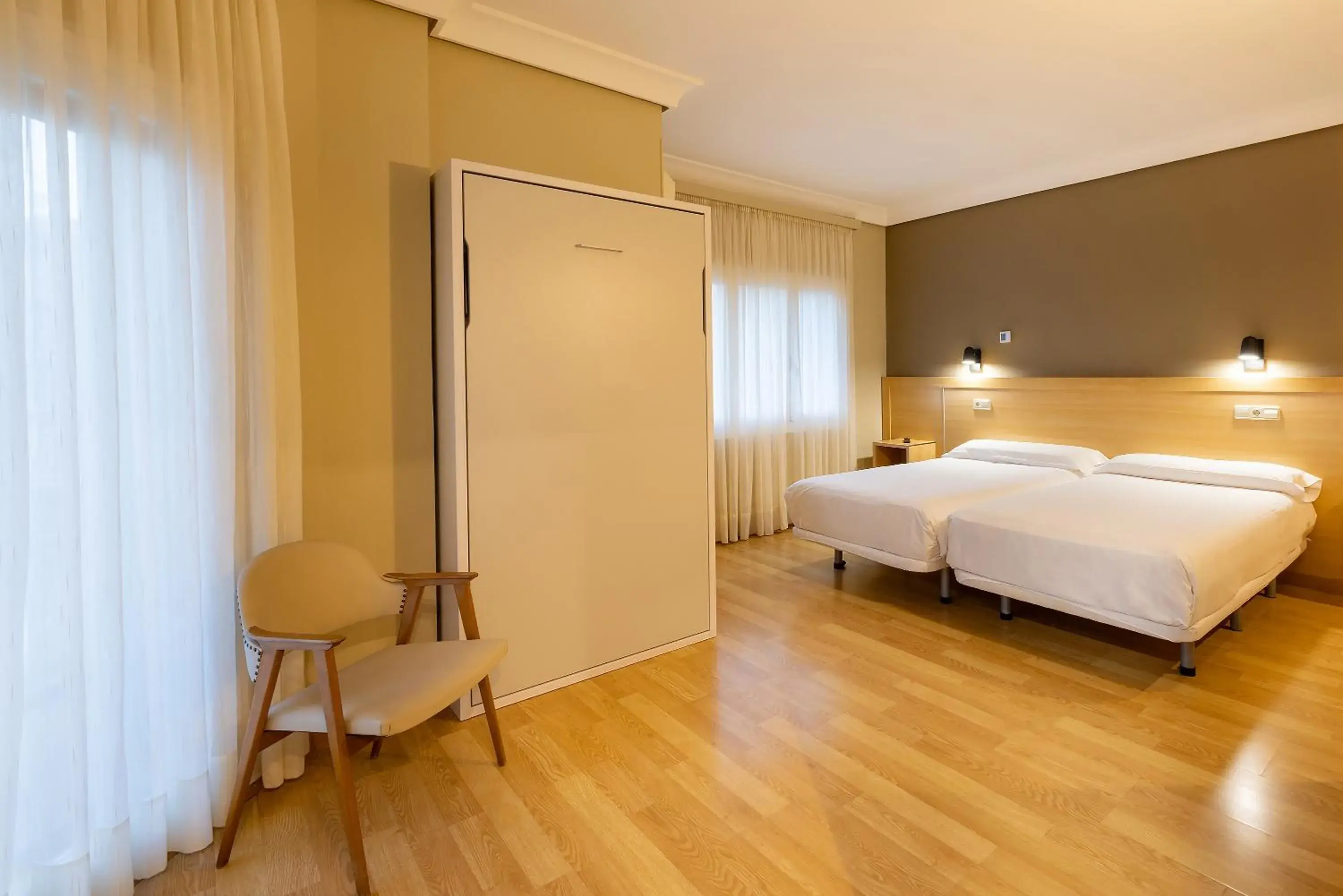 Property building, Bed in Hotel Santamaria