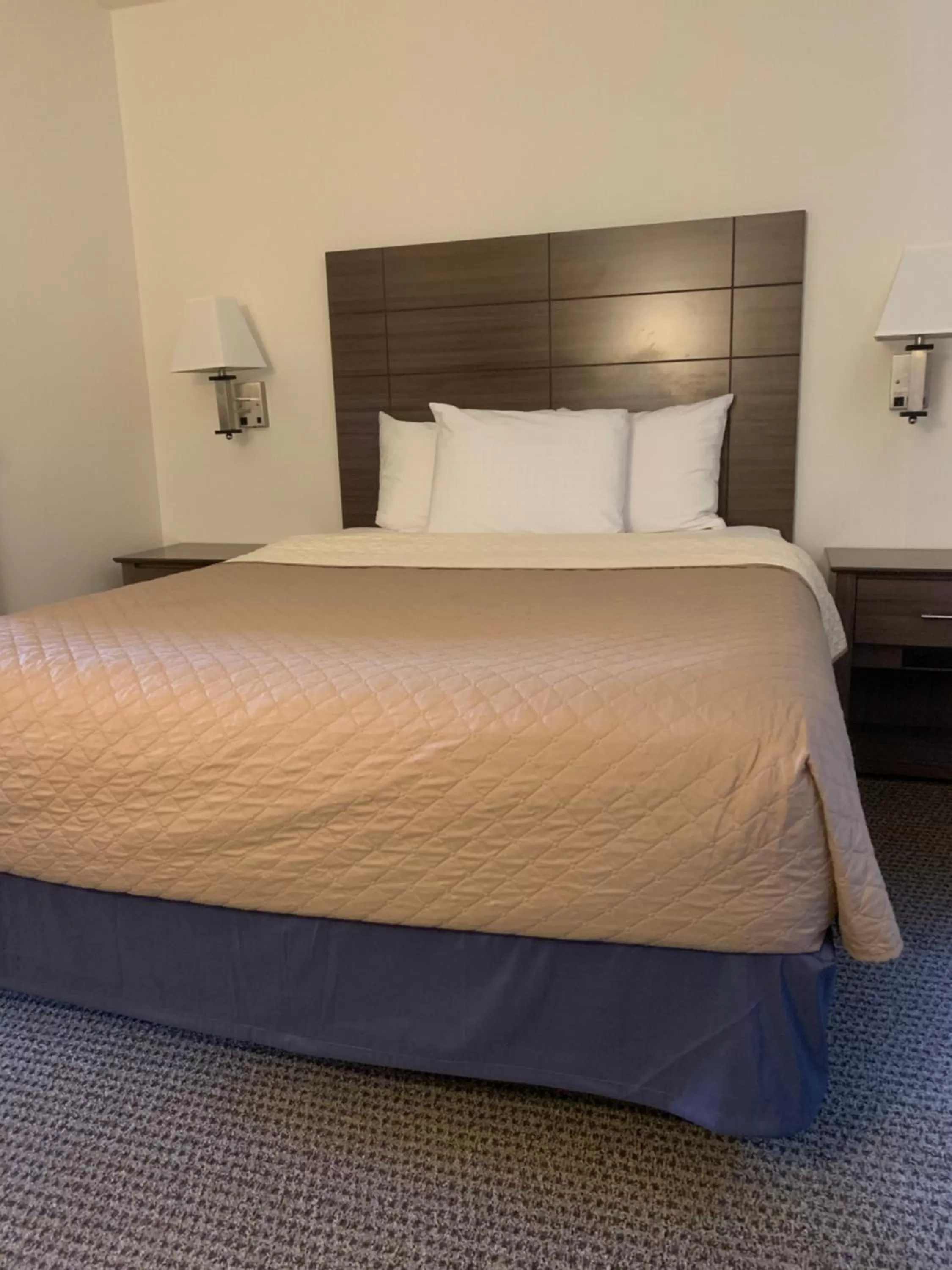 Bed in Lakes Area Inn