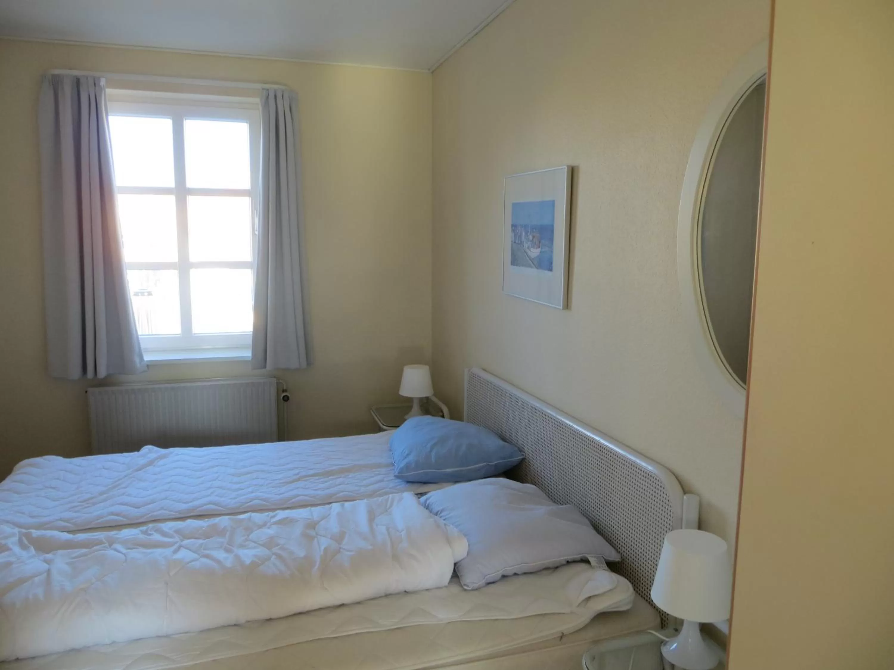 Bed in Løkken Badehotel Apartments