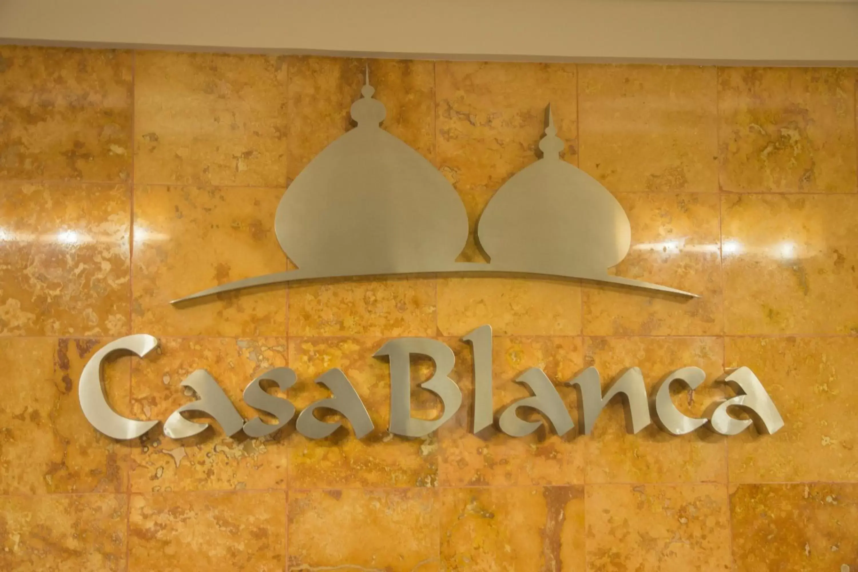 Property logo or sign in Hotel Casa Blanca