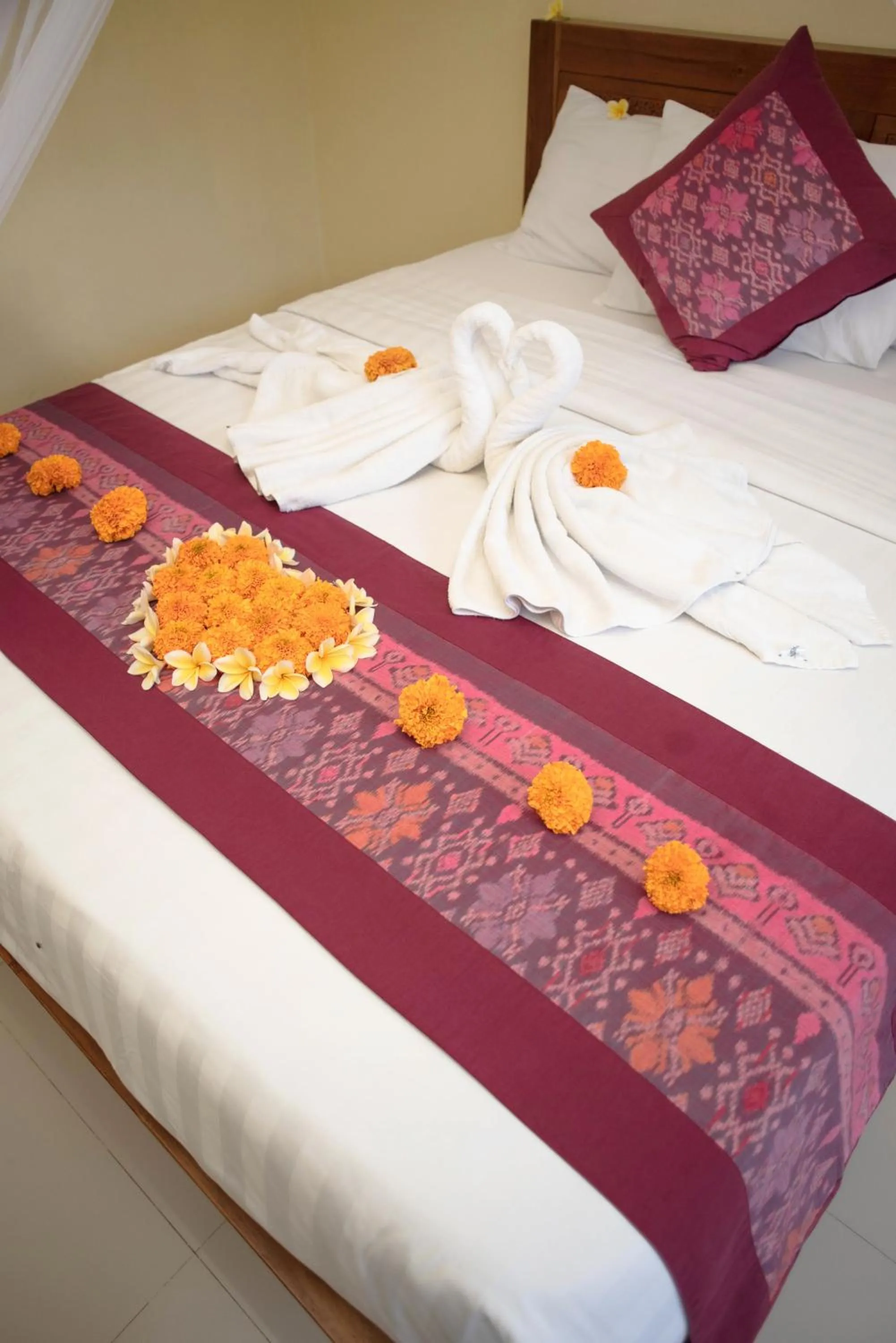 Bed in Suparsa's Homestay