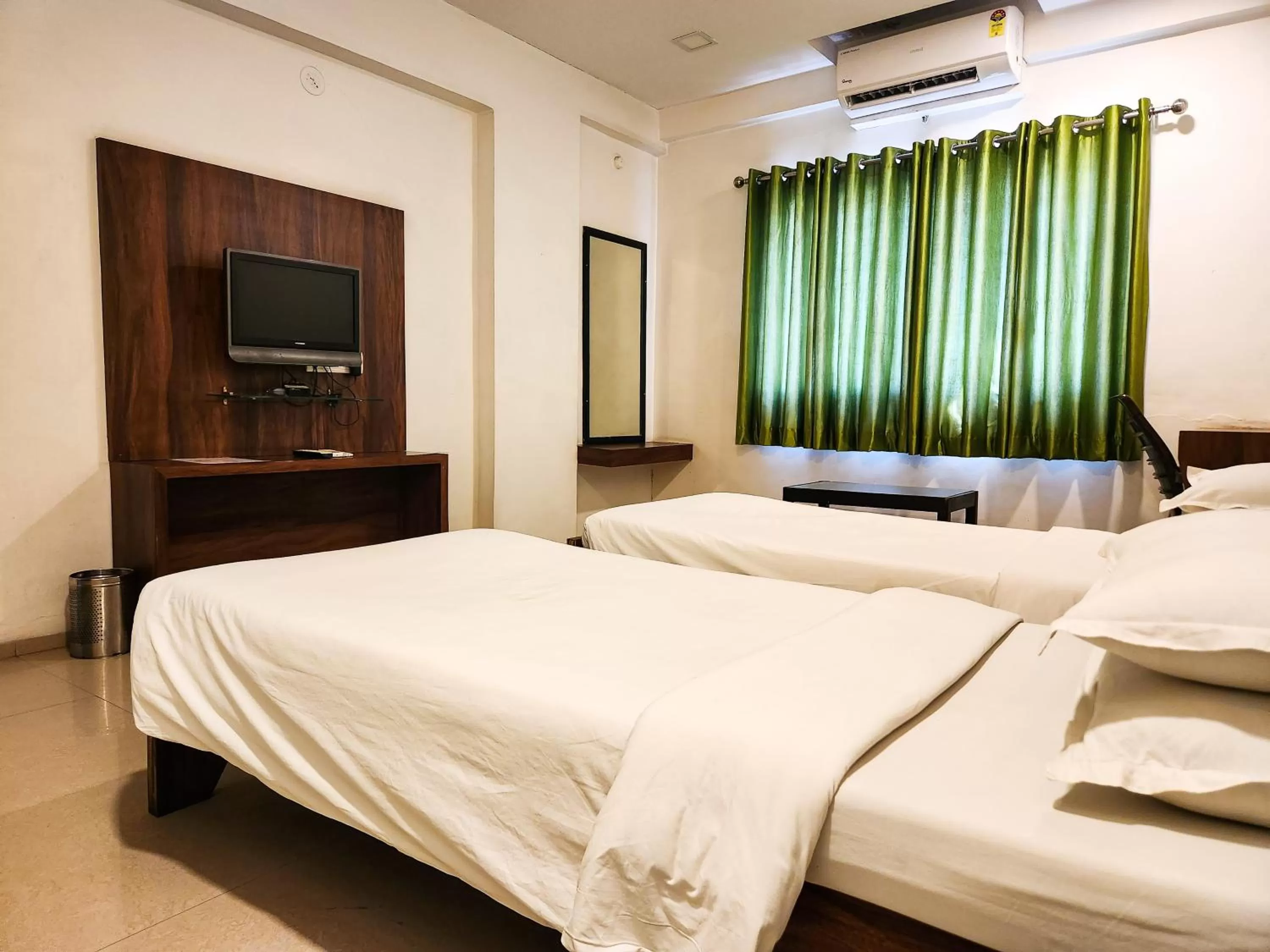 Bed in Hotel Rajwada Aurangabad