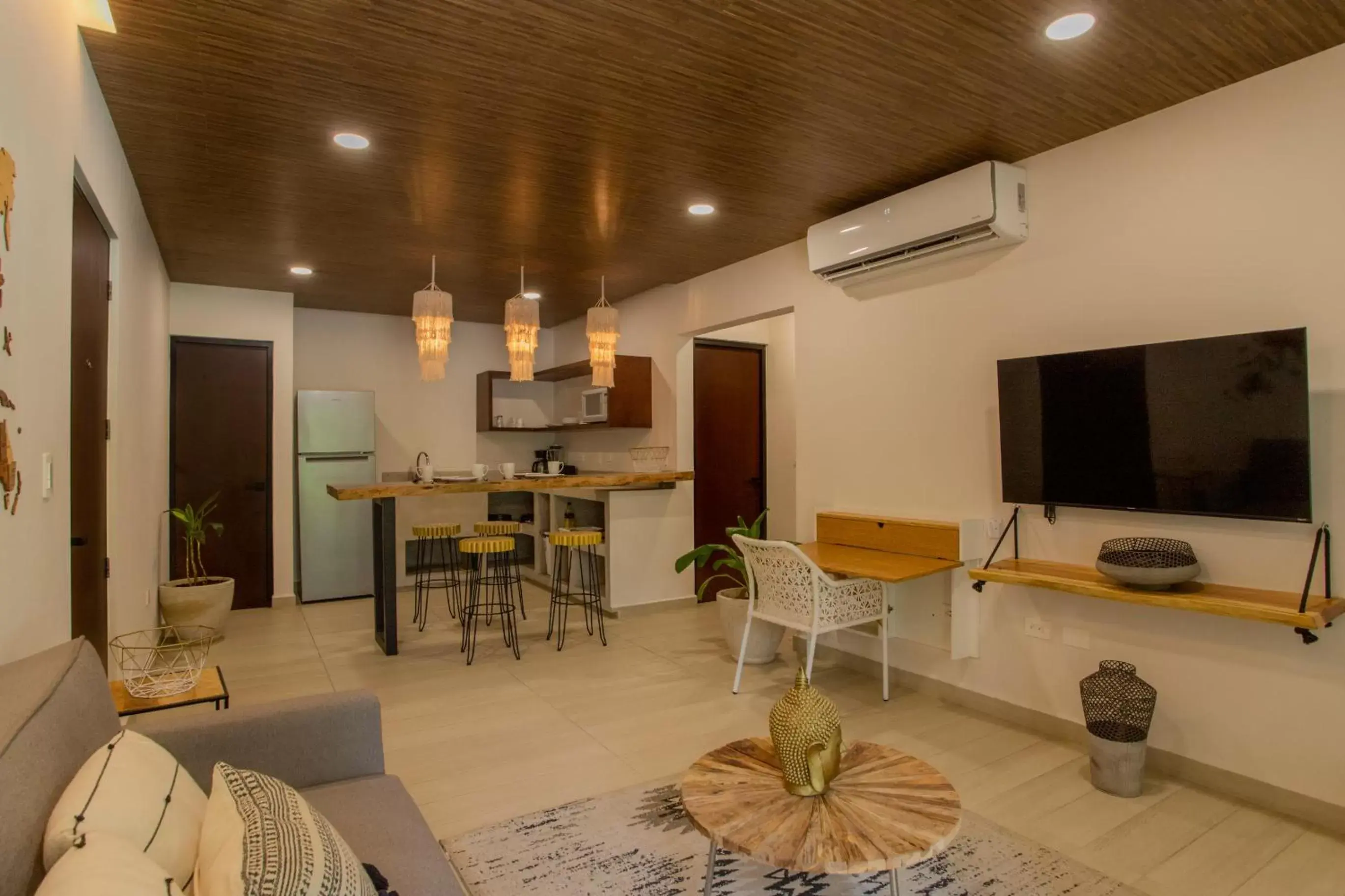 Living room, TV/Entertainment Center in Luxury Condos Macondo Tulum
