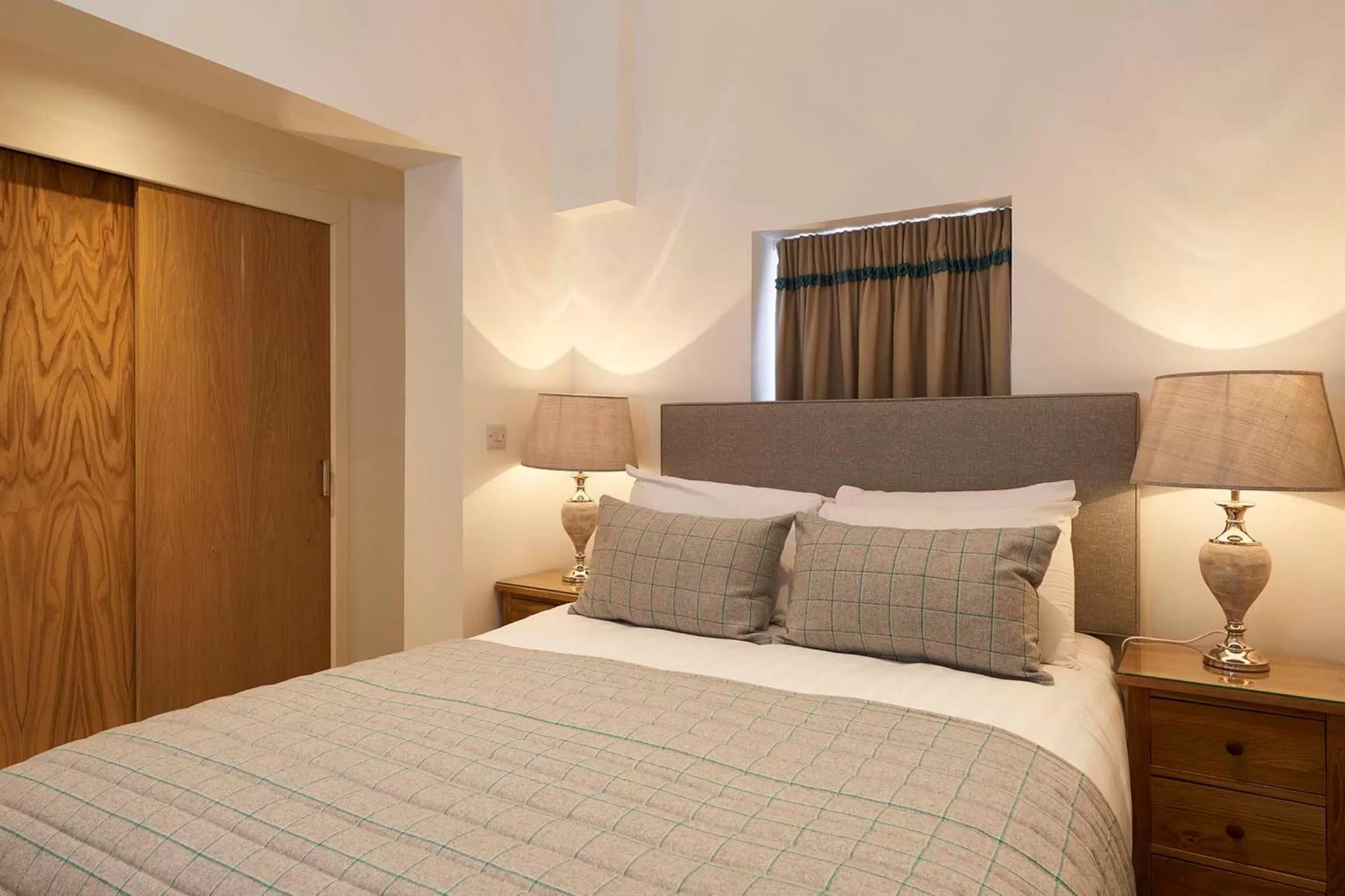 Bed in Braid Apartments by Mansley