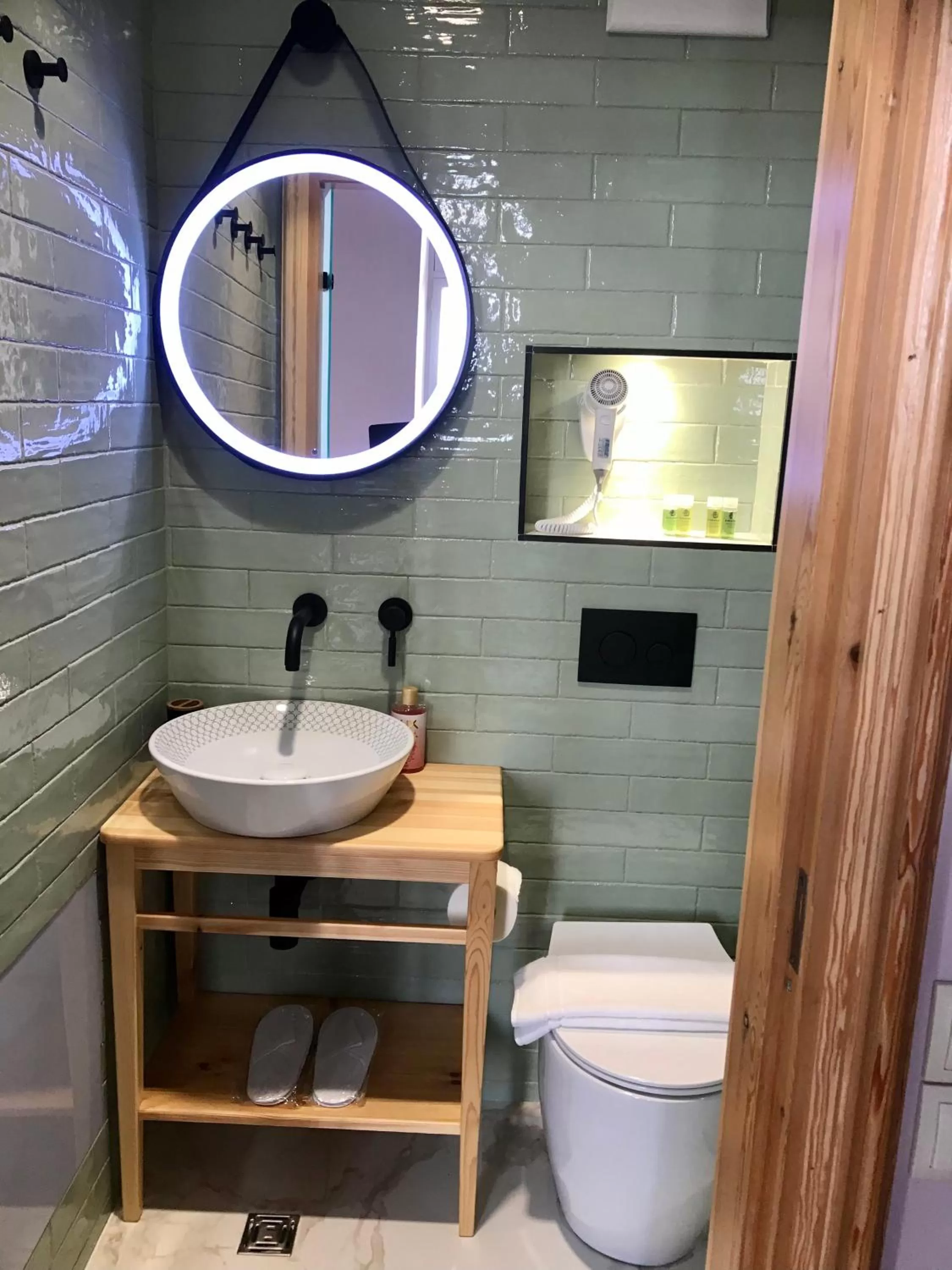 Bathroom in VASILIKON Hotel 1888 the past is present HISTORICAL PRESERVATION MONUMENT