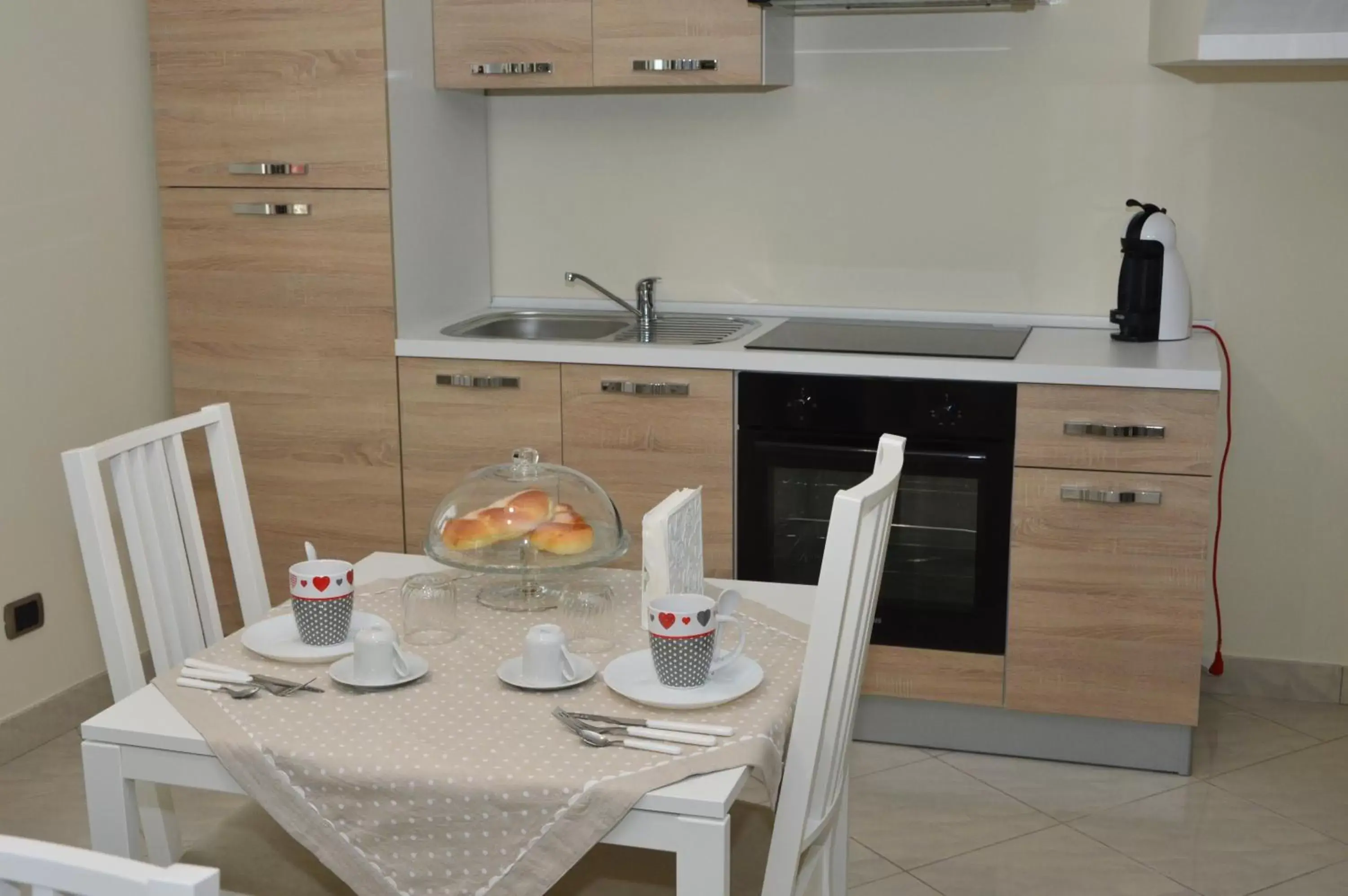 Communal kitchen, Dining Area in B&B La Colomba