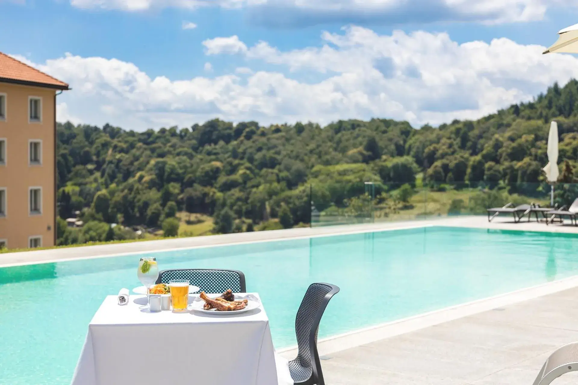 Food, Swimming Pool in Kurhaus Cademario Hotel & DOT Spa - Ticino Hotels Group