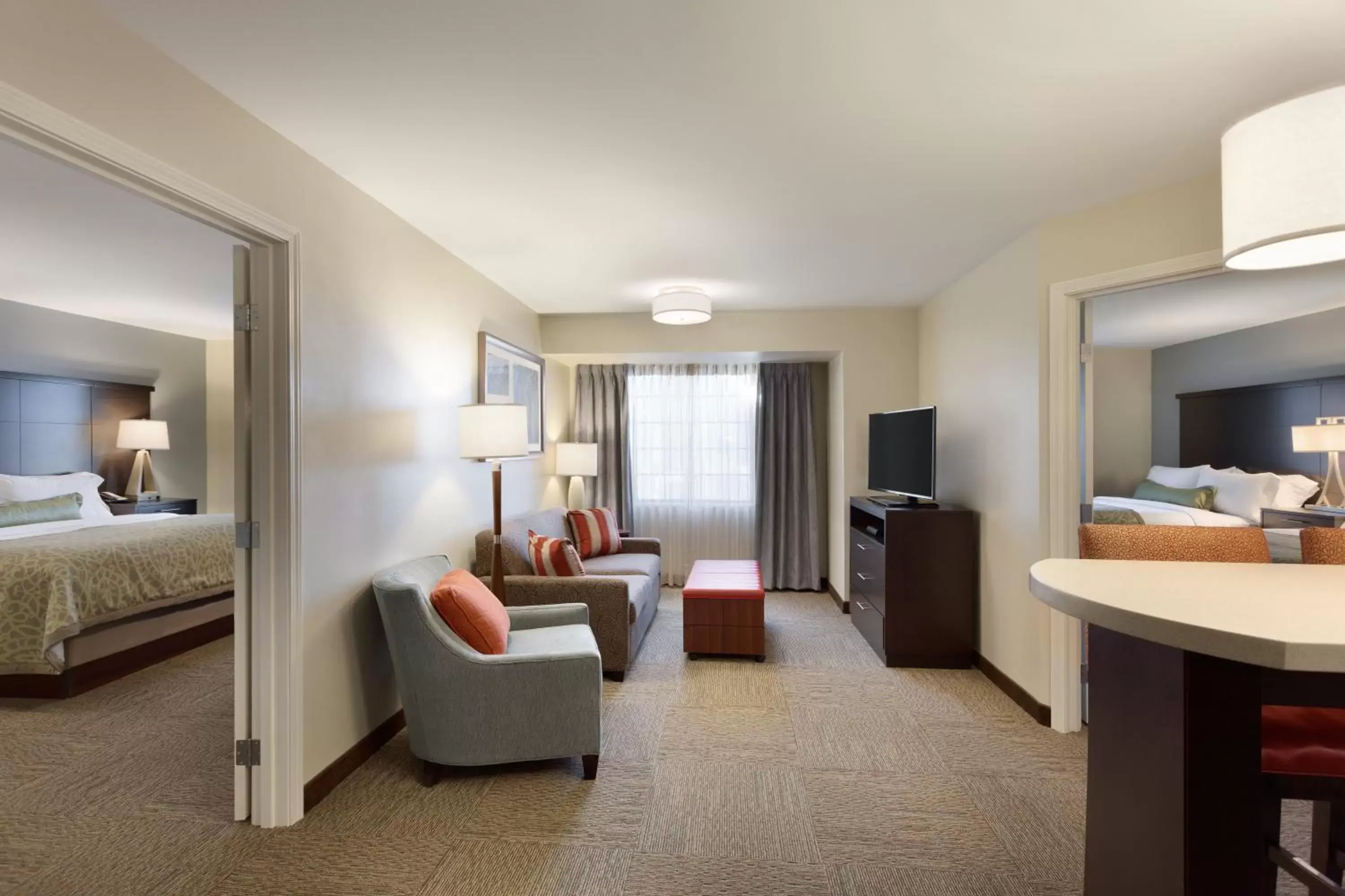 Photo of the whole room, Seating Area in Staybridge Suites Midland, an IHG Hotel