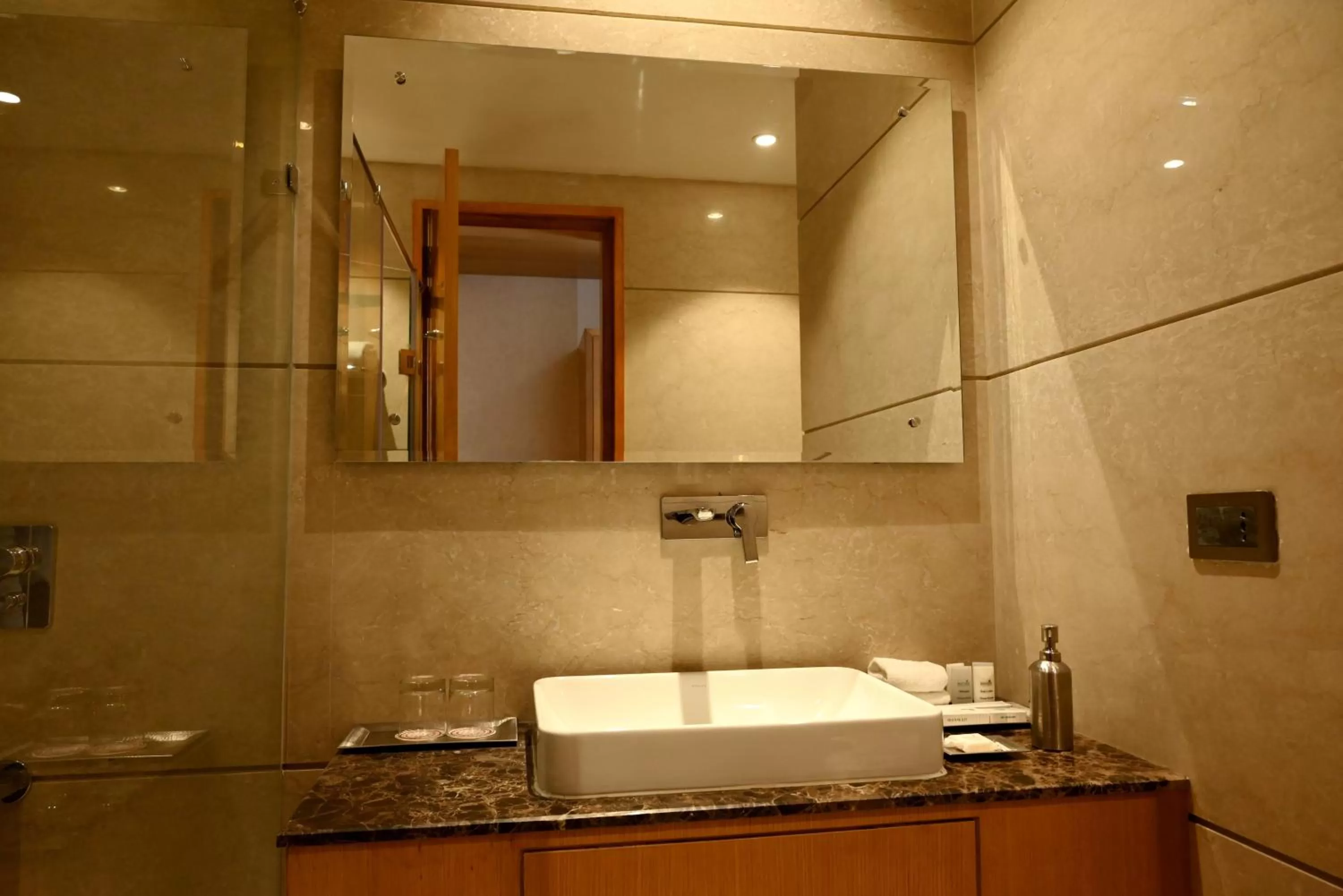 Bathroom in Ramada Plaza by Wyndham Jammu Vijaypur
