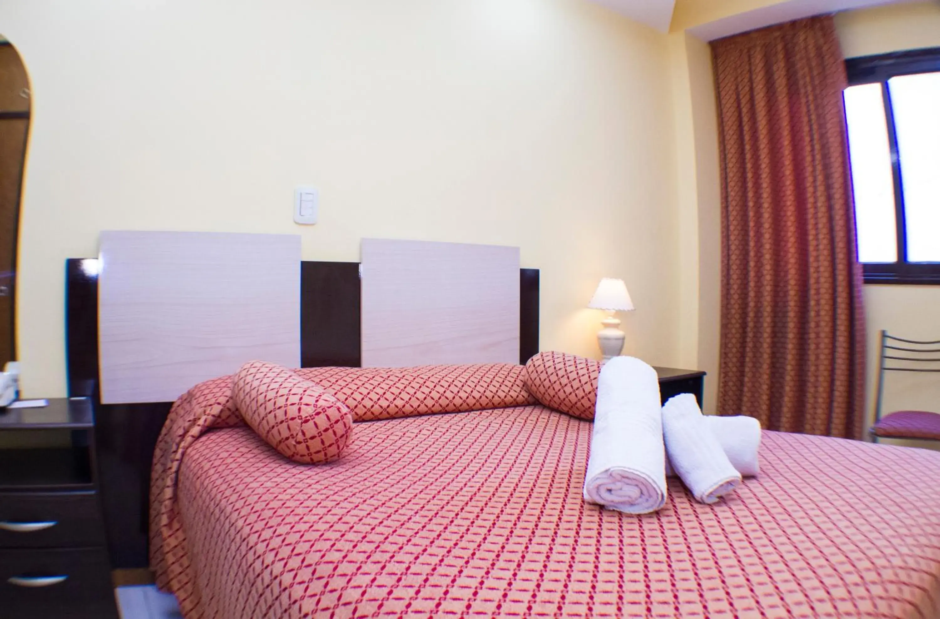 Bed in San Remo City Hotel